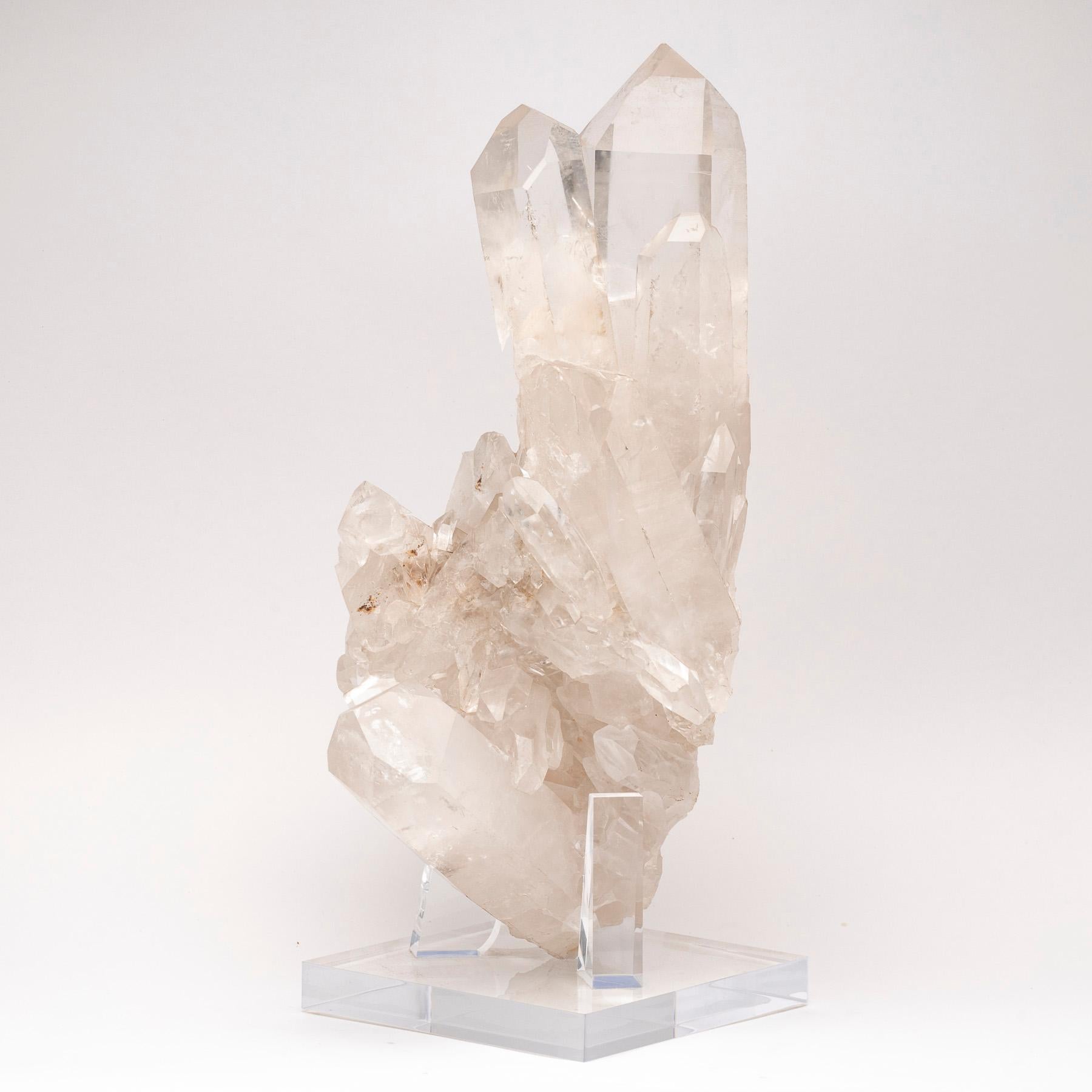 Natural Brazilian quartz multipoint specimen mounted on custom acrylic base.