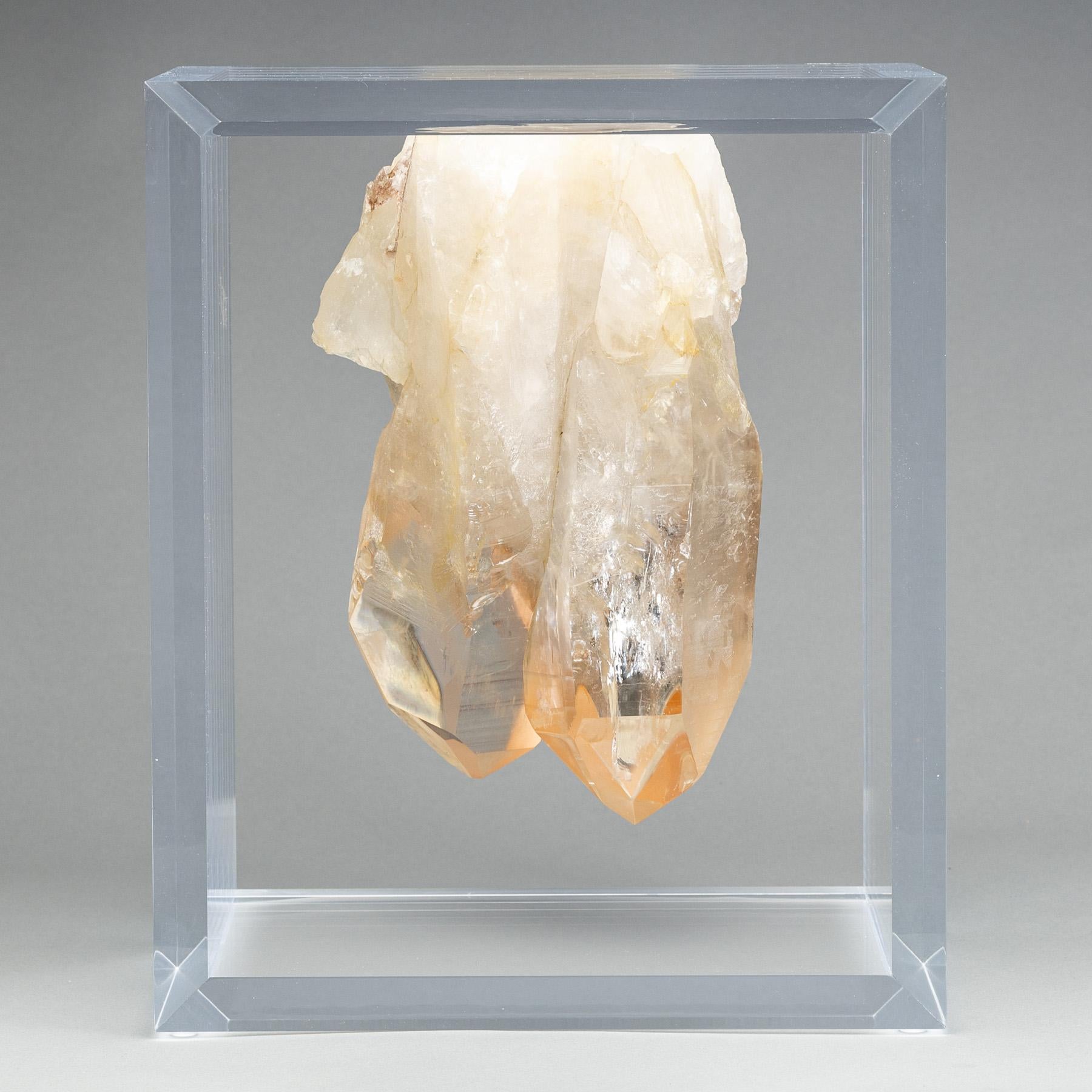 Impressive natural Brazilian double point quartz, mounted on a original design in a custom acrylic box-
