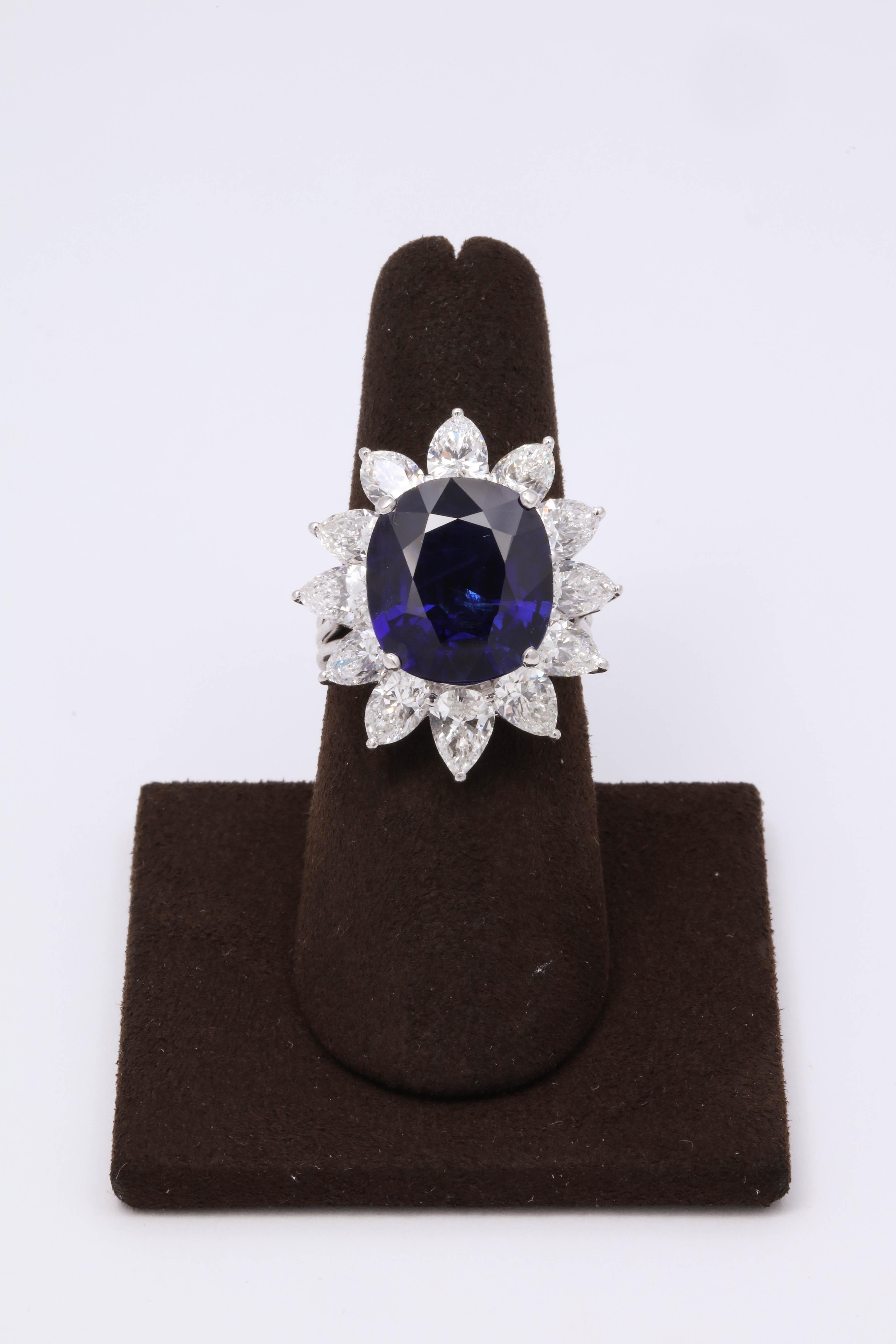 
A collectors item!!

Exquisite 9.73 carat cushion cut Blue Burma Sapphire -- the stone is completely natural with zero enhancement -- 
