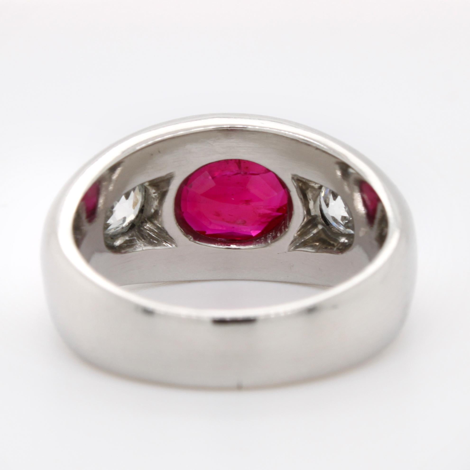A natural Burma ruby and two round old European cut diamond ring in white gold. The ruby weighs 1,66ct and is accompanied by a German gemological certificate stating that the ruby is from Burma, natural and not heat treated. The diamonds weigh circa