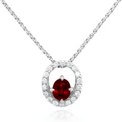 Gema de Rubí de Birmania natural de 0,51 quilates engastada en Colgante de Platino con Diamantes