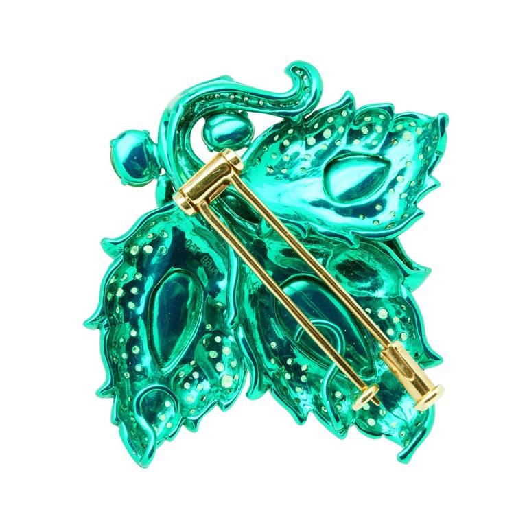 The Mock Strawberry Pendant/Brooch from 'The Chloris' Yard Collection' by Austy Lee. This mesmerizing piece is composed of very fine quality Burmese Type A Jadeites, Tsavorites and Diamonds, set on green color-plated 18K Yellow Gold.

Product