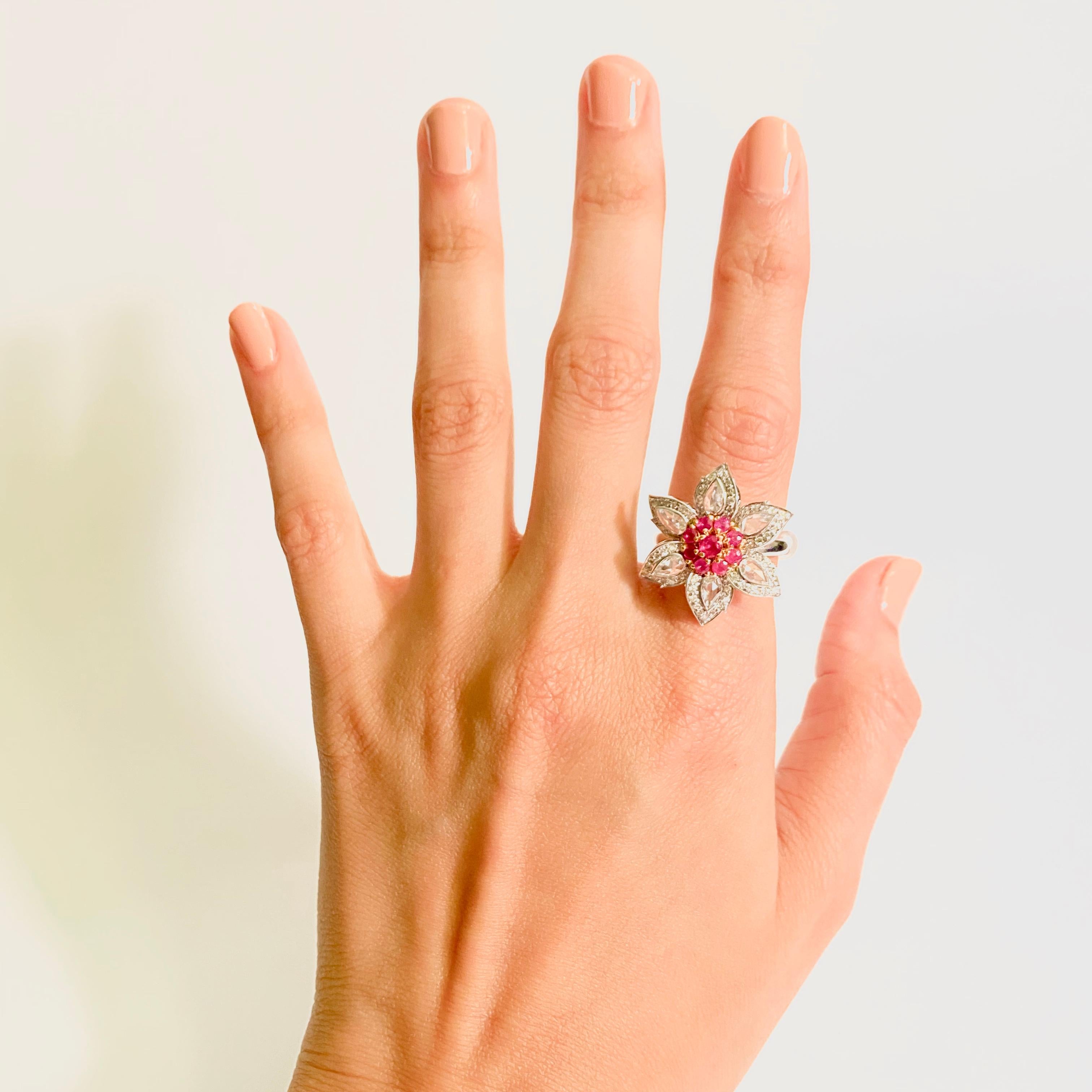 A life like rendition of the Rafflesia flower, this ring features 0.71 carats of natural Burmese rubies flanked by rose cut diamonds.
Round Brilliant & Rosecut Diamonds
Shape	Rose cut
Color	F
Clarity	VVS
Weight	0.71 carats
Additional Diamonds