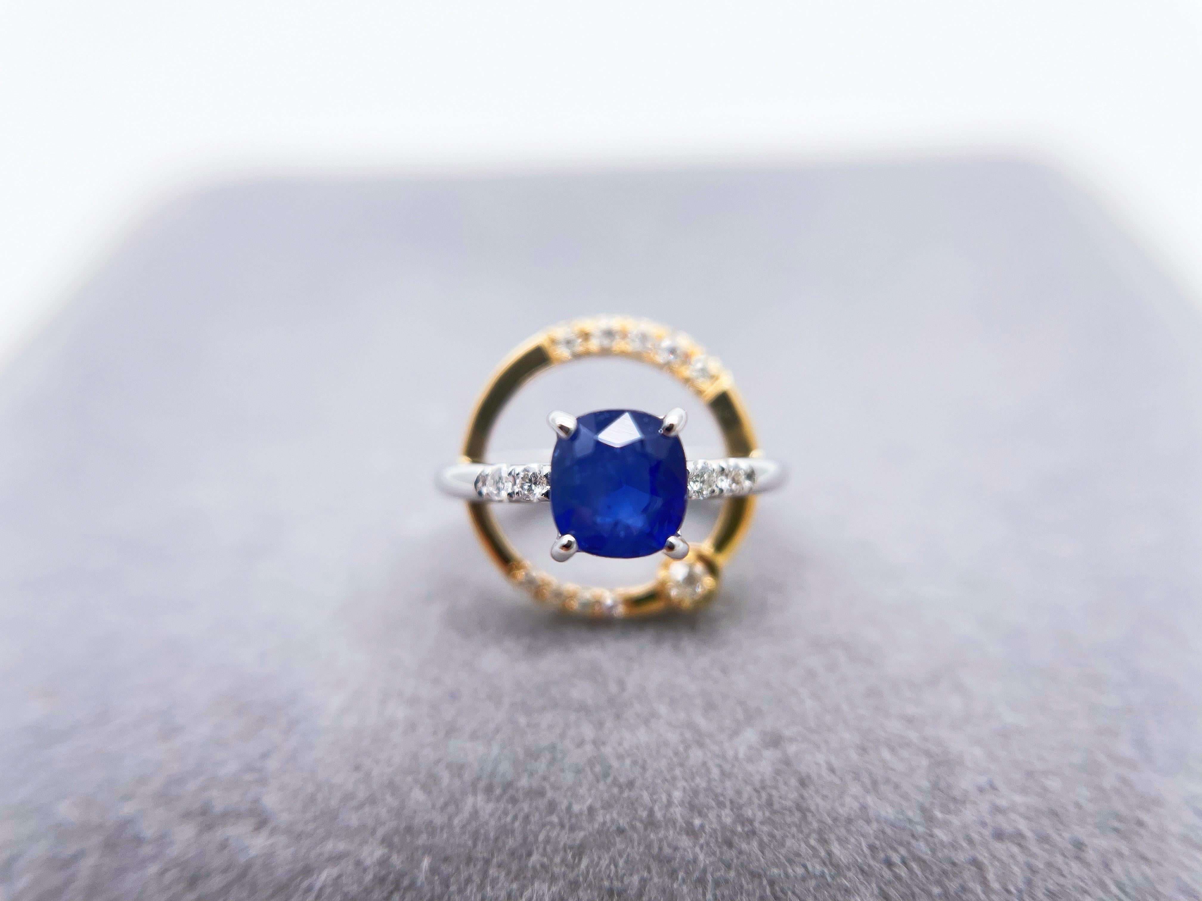 Make a bold statement with this Galaxy-inspired pendant.  Embellished with a stunning natural blue sapphire, it will add a modern and mysterious touch to your everyday outfit. The center natural Burmese sapphire is 0.648 carats with intense bright