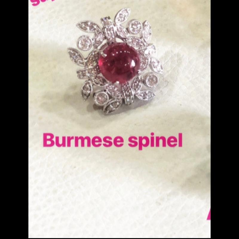 Striking Burma Spinel Studs set in 18K white gold with diamonds. The Spinels are natural Burma, without any treatment. The combined weight of Spinel is 16.82 carats, and the diamonds weigh 2.21 carats. The earrings are made in Art Deco style. The