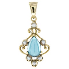 Natürlicher Cabochon Blautopas und Perle Vintage filigraner Anhänger in massivem 9K Gold
