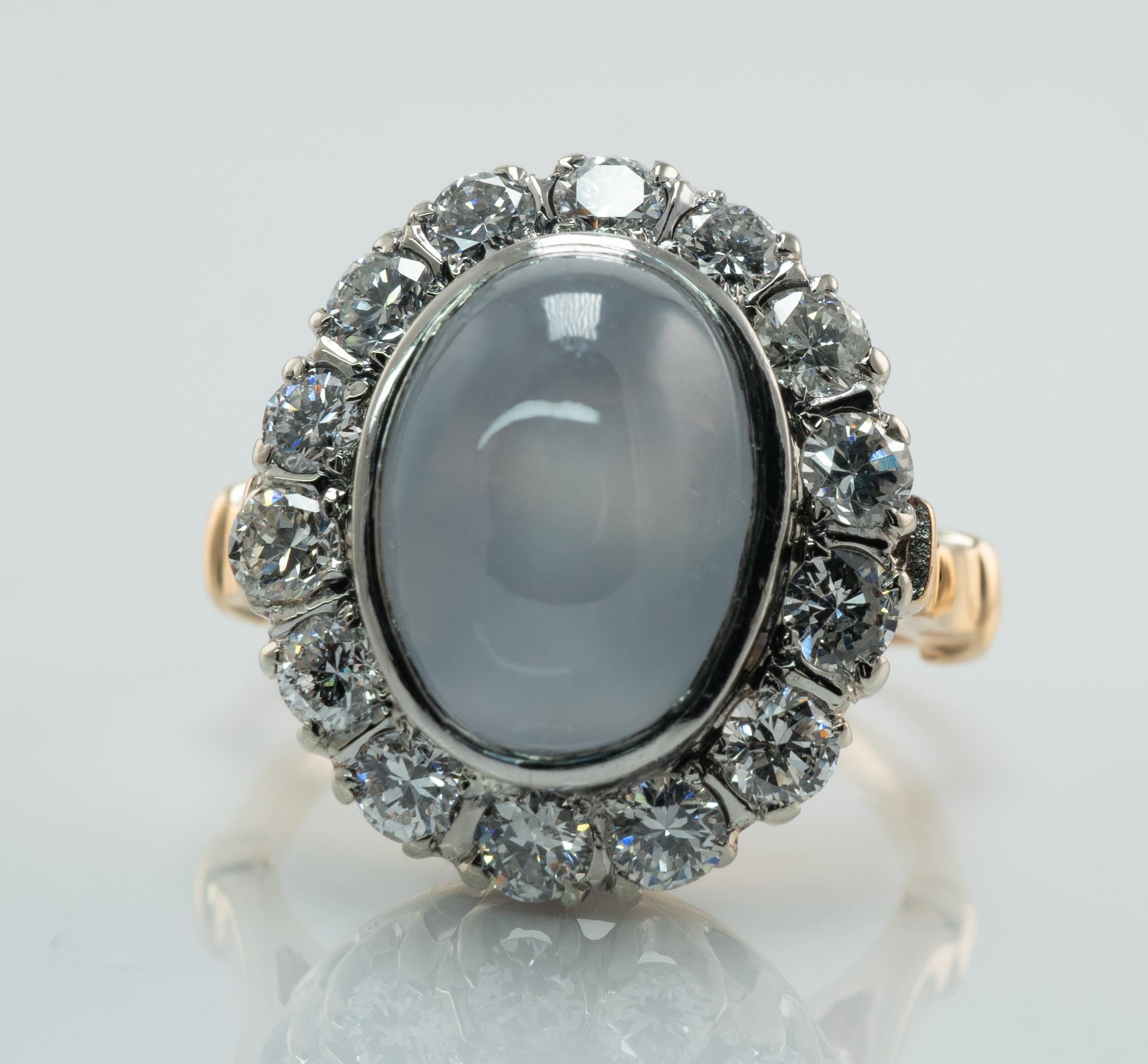 Natural Cabochon Star Sapphire Diamond Ring 14K Yellow Gold Vintage

This vintage ring is crafted in solid 14K Yellow Gold.
The center natural Earth mined Sapphire cabochon measures 12mm x 09mm (about 5.00 carats).
The gem has minor blemish on the