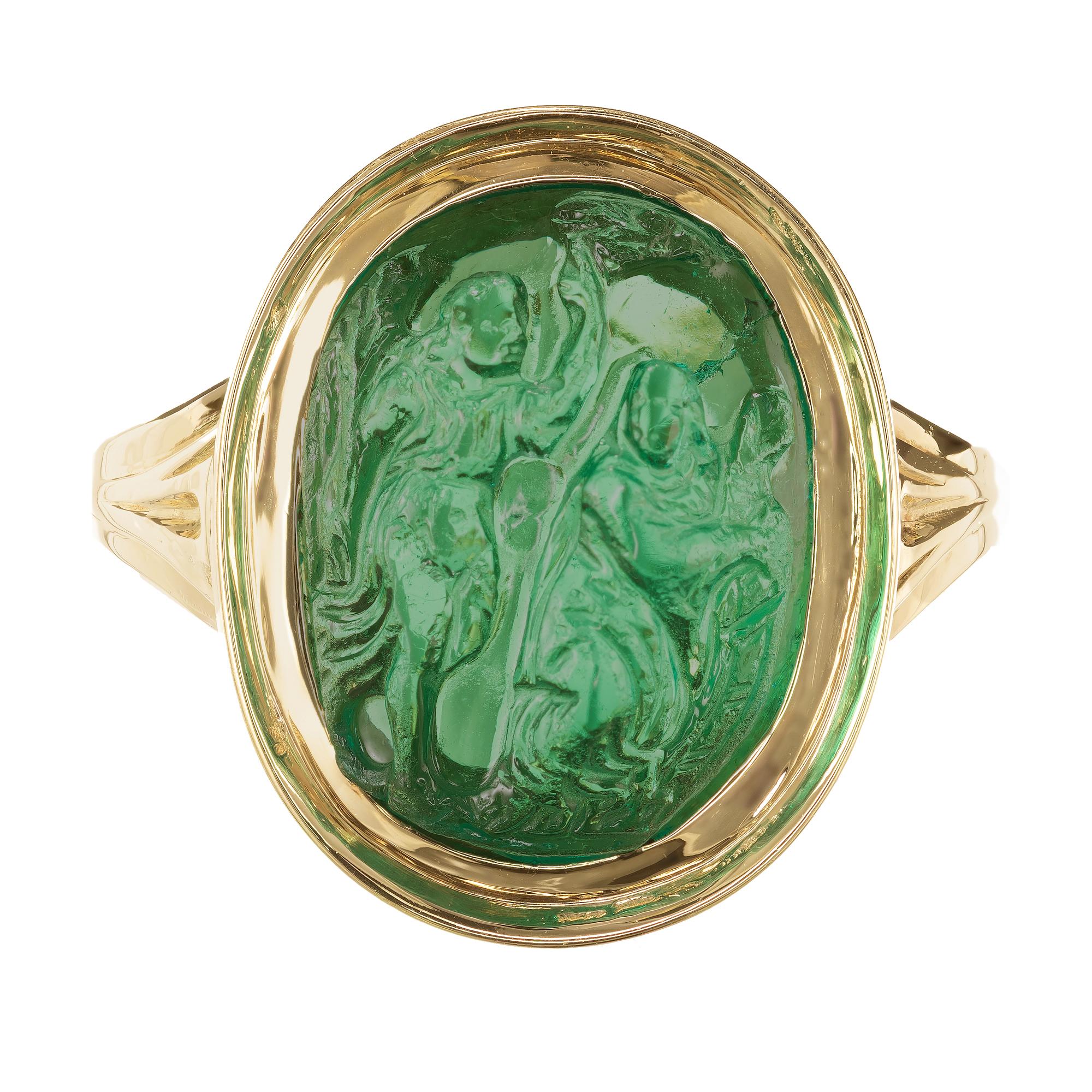Late 19th century Untreated natural carved emerald ring. No oil, no heat and no enhancements. AGL certified Colombian natural color. Emerald carving of a male set in an 18k yellow gold setting.

Size 7 and sizable
Ring tested: 18k
3.5 to 4.5cts
AGL