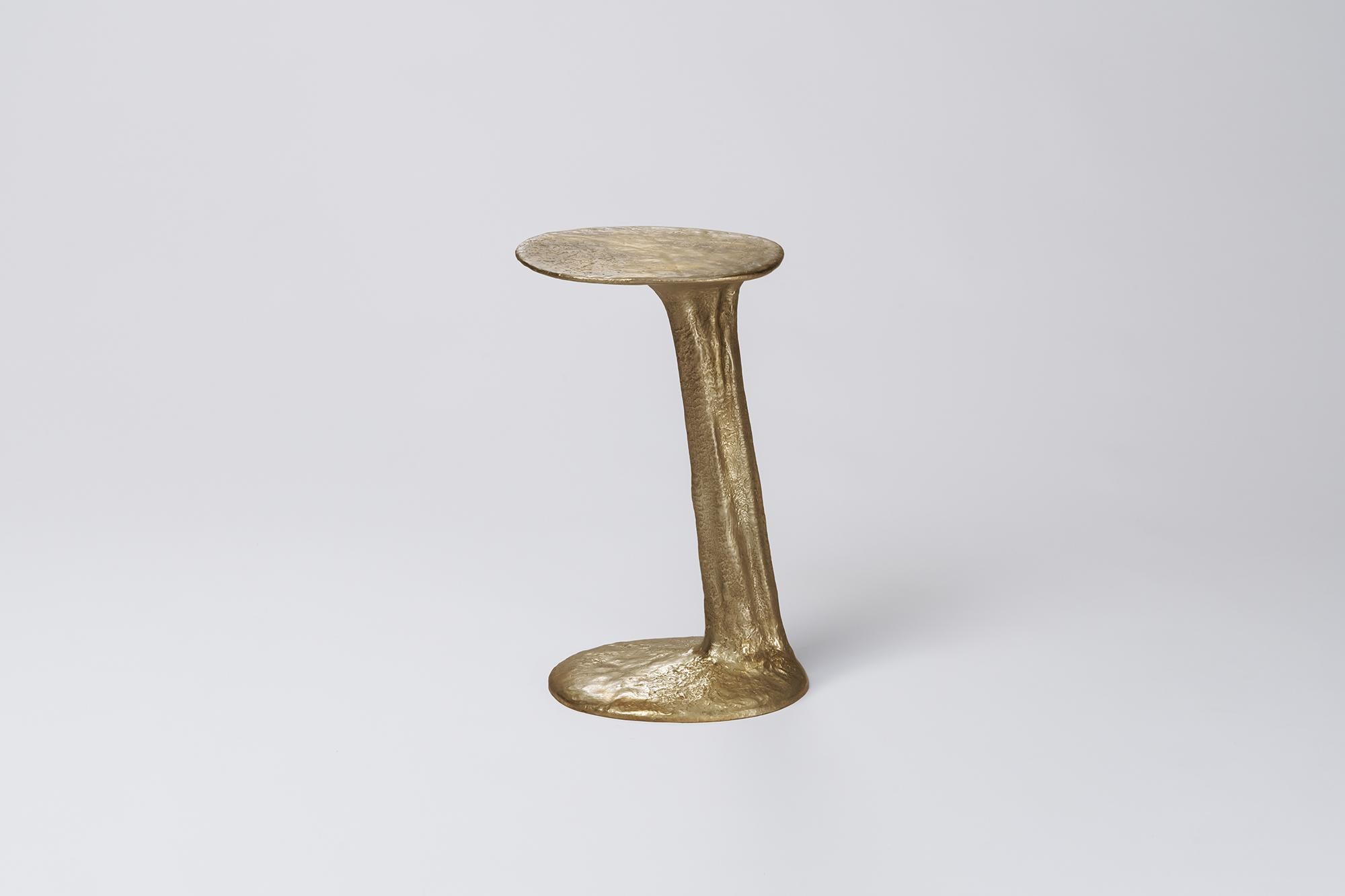 Natural Cast Brass Lava Small Side Table by Atelier V&F
Dimensions: D 35 x W 30 x H 53 cm. 
Materials: Cast brass with a natural finish.

Available in different finishes (cast, black and silver). Available in two different sizes. Prices may vary.