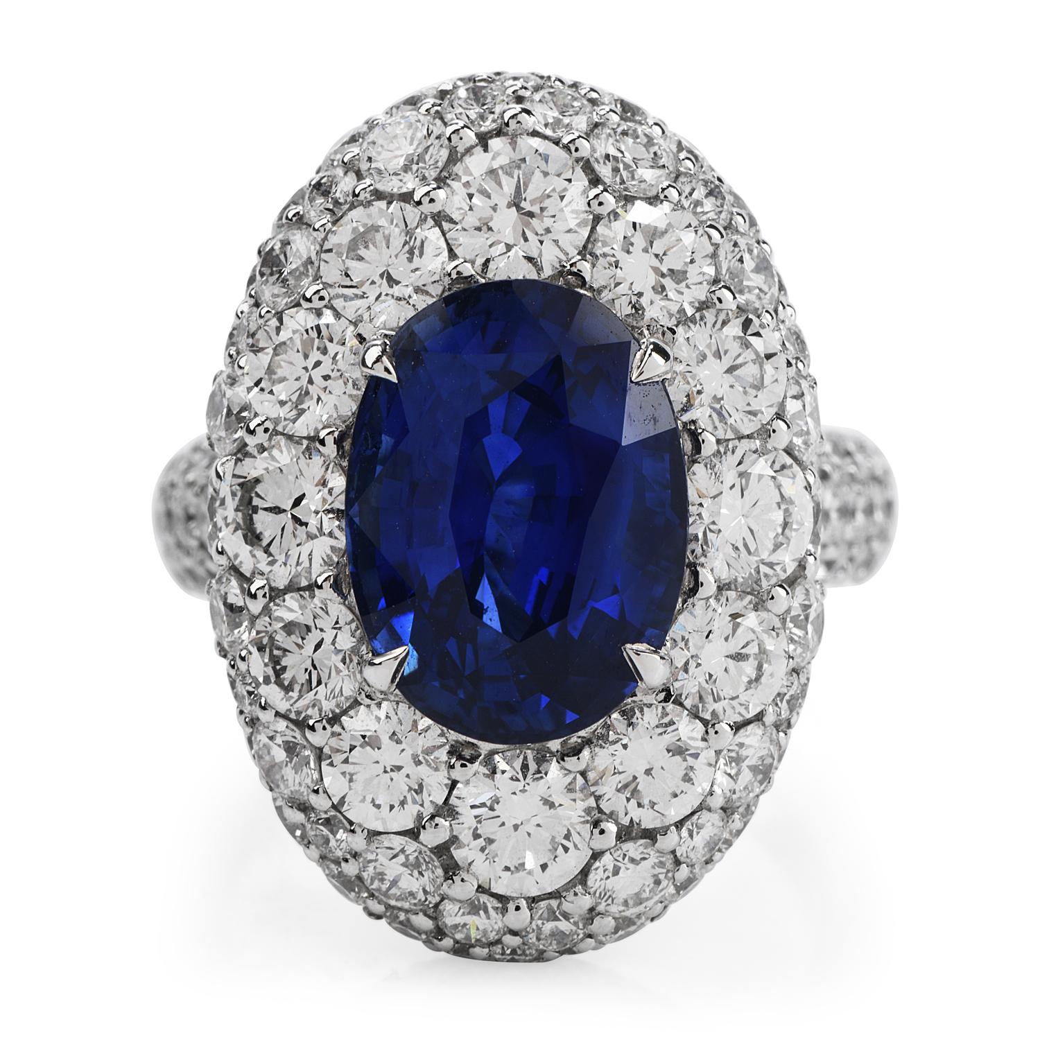 This pristine condition Diamond and Sapphire cocktail ring is and crafted in 18k white gold.

Prominently showcased a Ceylon (Sri Lanka) Blue sapphire All Natural Royal Blue color, accomponied With  GRS Lab report indicating this Gem  natural