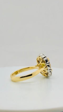 Natural Certified 4.46 Carat Oval Cut Golden Sapphire and Oval Halo Diamond Ring