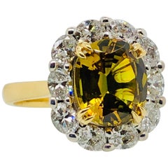 Natural Certified 4.46 Carat Oval Cut Golden Sapphire and Oval Halo Diamond Ring