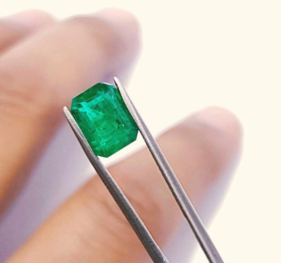 Classical Greek Natural Certified Sandawana Emerald Loose Gemstone 8.2x6.2x4.8 mm Emerald Cut. For Sale