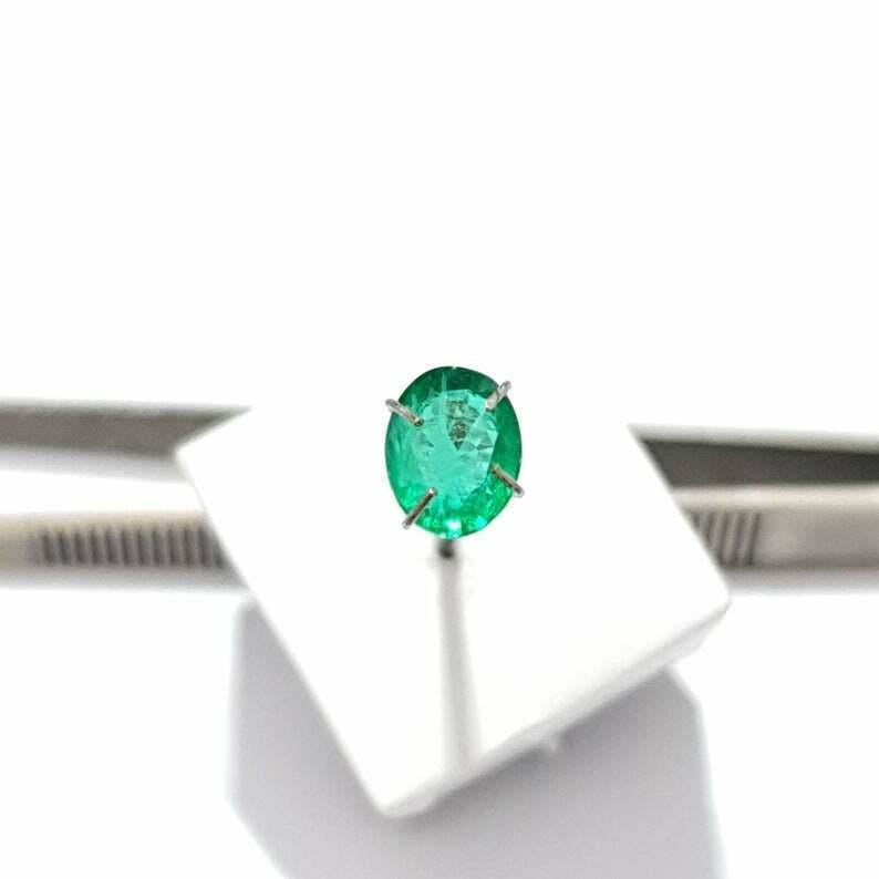 Aesthetic Movement Natural Certified Sandawana Emerald Oval Cut 1.30 Cts Oval Loose Emerald. For Sale