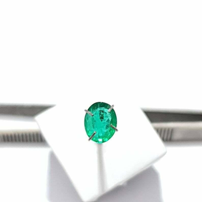 Aesthetic Movement Natural Certified Sandawana Emerald Oval Cut 1.30 Cts Oval Loose Emerald. For Sale