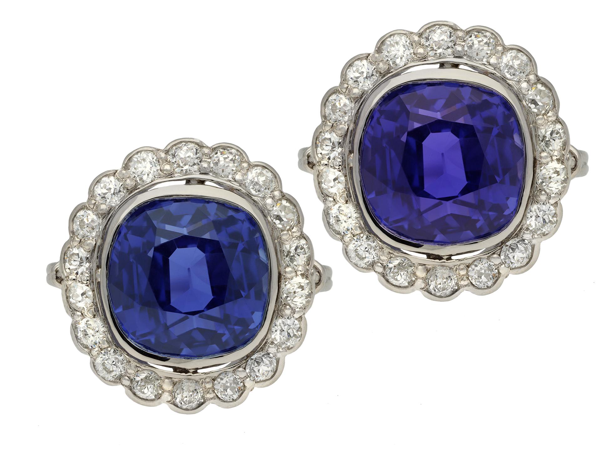Ceylon colour change sapphire and diamond coronet cluster ring. Centrally set with a cushion shape old cut natural unenhanced Ceylon blue/purple colour change sapphire, blue in daylight, purple in incandescent light, in an open back rubover setting