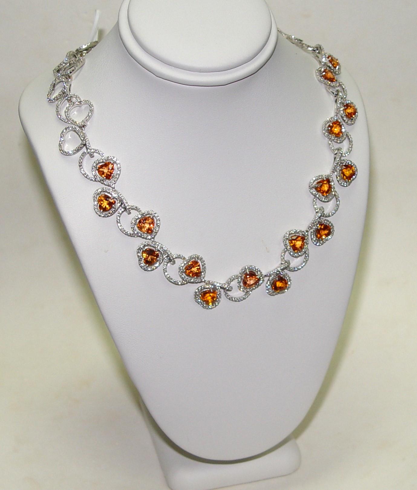 This necklace was evaluated by Christian Dunaigre AG, DUG with C. Dunaigre Consulting GmbH Switzerland. Please check gemstone report # CDC 2303394/1-16 for the details. Necklace set with 16 (estimated 20.00CT) of  Natural Sapphires - ORANGE COLOR,