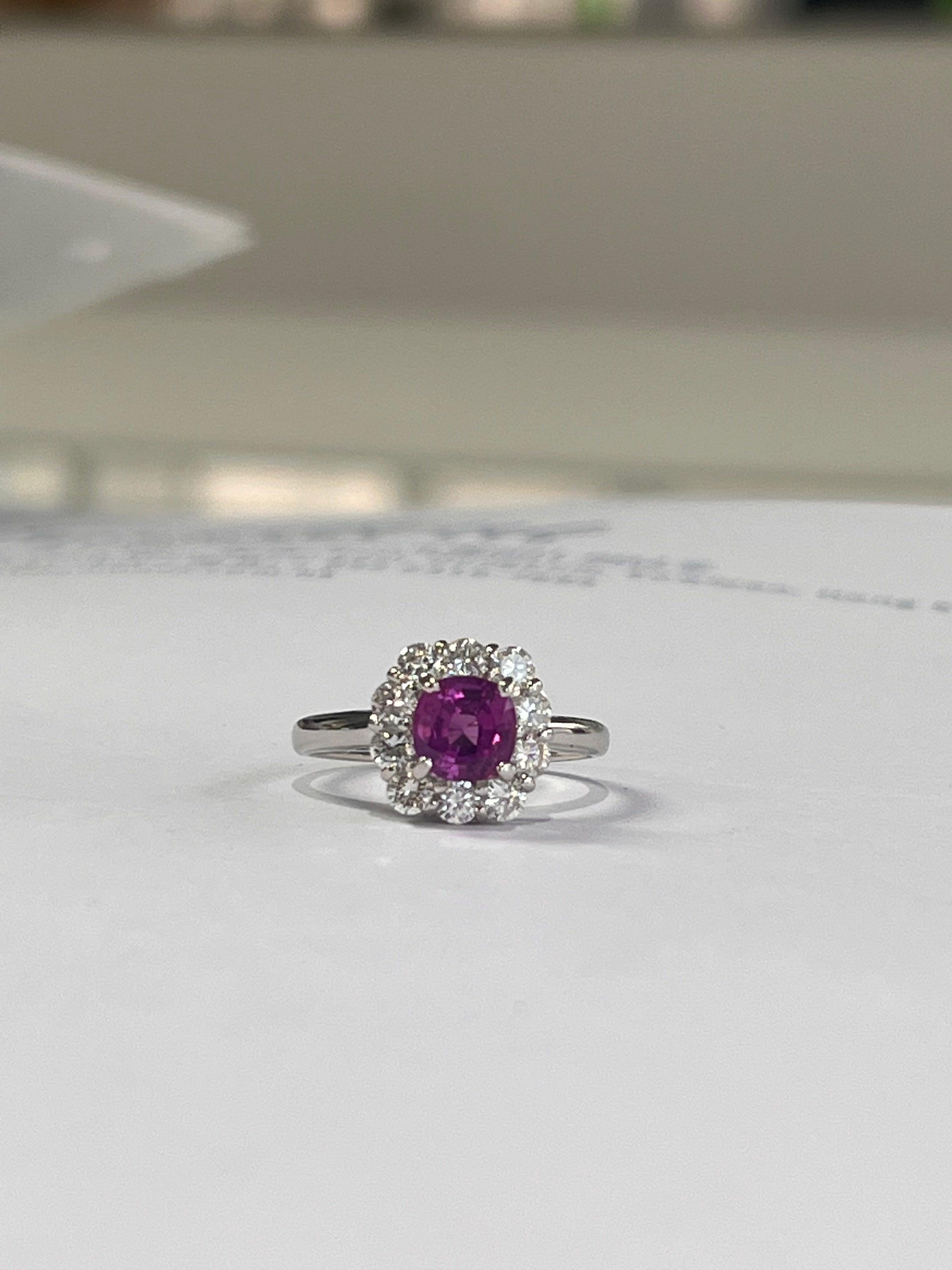 A very beautiful and wearable, natural Pink Sapphire Engagement Ring set in Platinum 900 & Diamonds. The weight of the Pink Sapphire is 1.18 carats. The Pink Sapphire is of Ceylon origin. The weight of the Diamonds is 0.64 carats. Net PT weight is