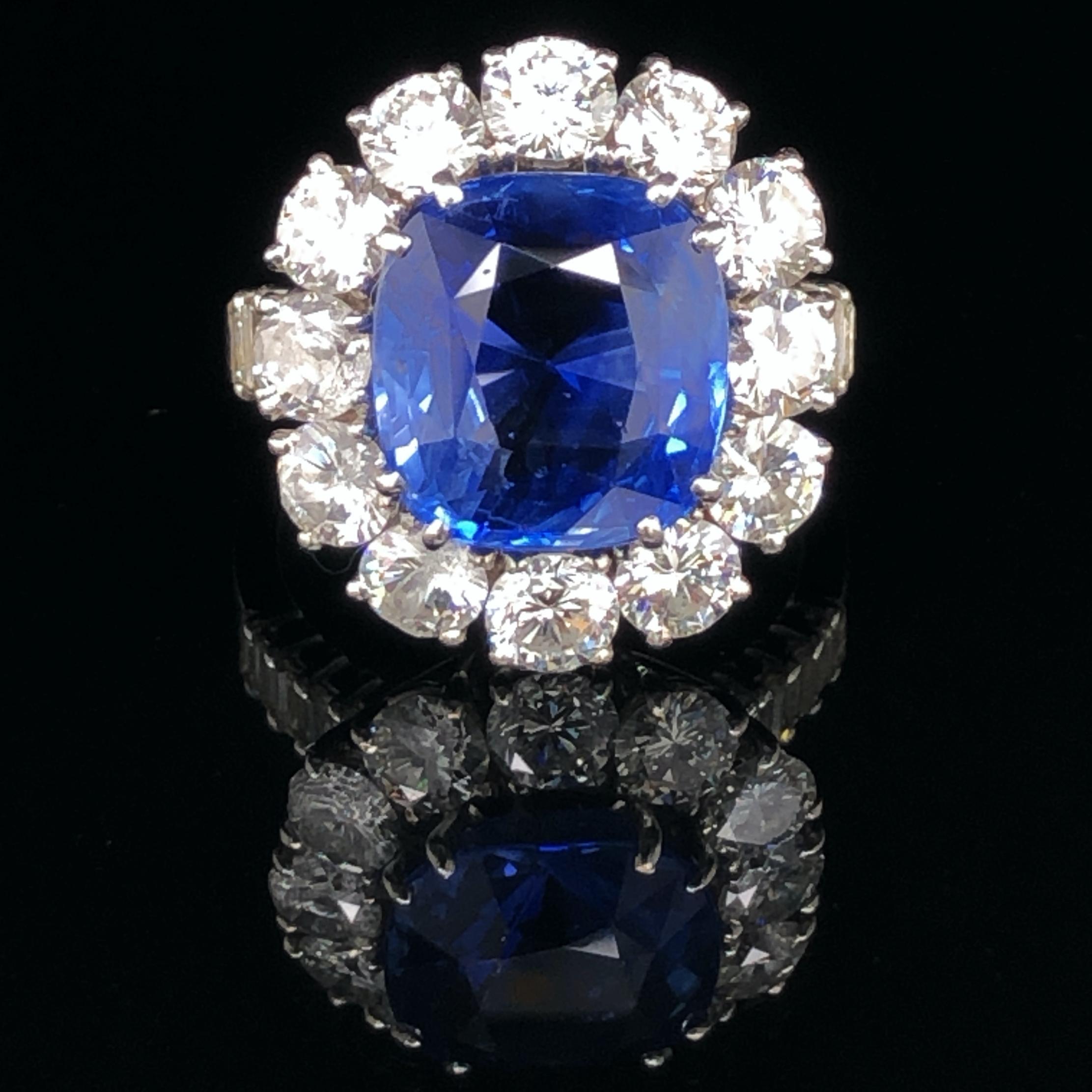 A beautiful sapphire and diamond Lady Diana ring in platinum. The centre sapphire weighs 8.00 carats, is not heated and of Ceylon origin. It has a soft, yet strong blue colour with no eye visible and only very minute inclusions, which also indicate