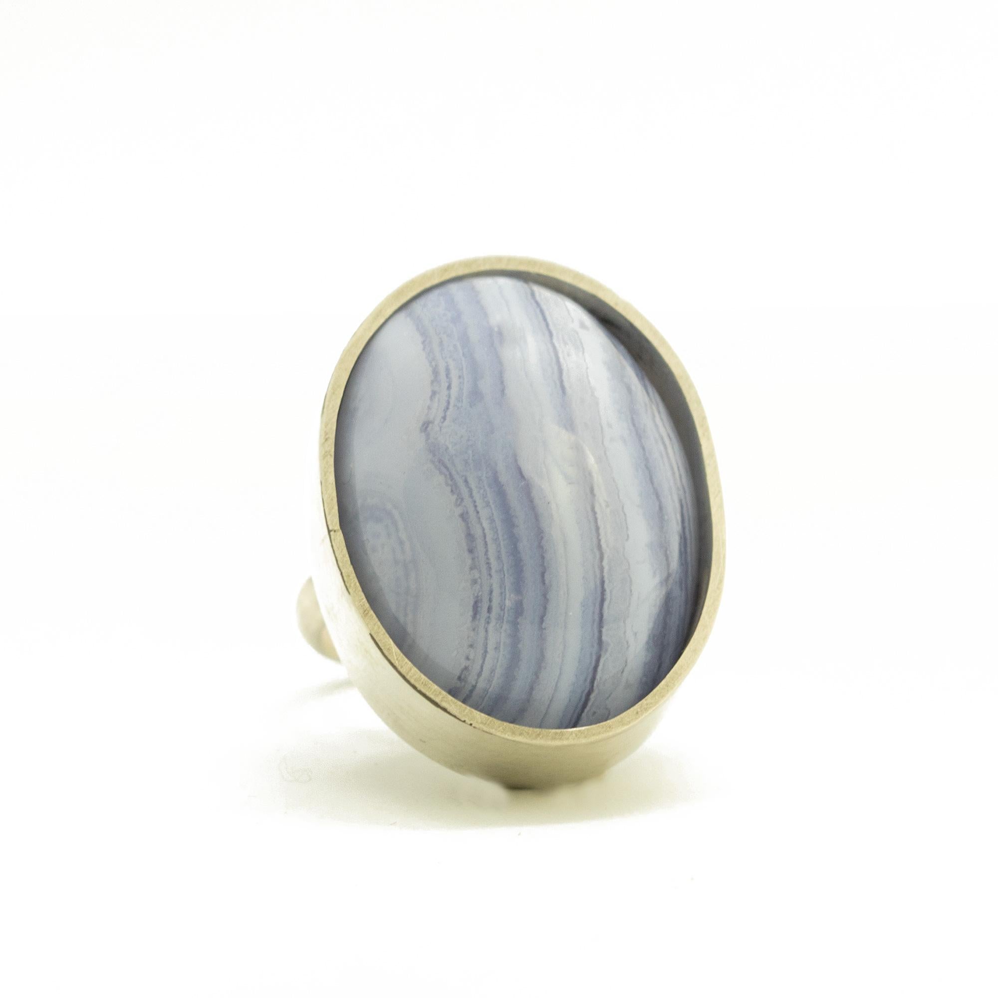 Artistry ring, 100% Handmade in Italy with high quality semi-precious stone.

• 925 Sterling Silver
• Chalcedony Oval Cabochon 2.8 x 2.0 cm, 45 carats
• Total weight 22.2 g
• Size: 6.5 (US), 13 (France),  53 (Italy). Size can be re-adjusted

Please