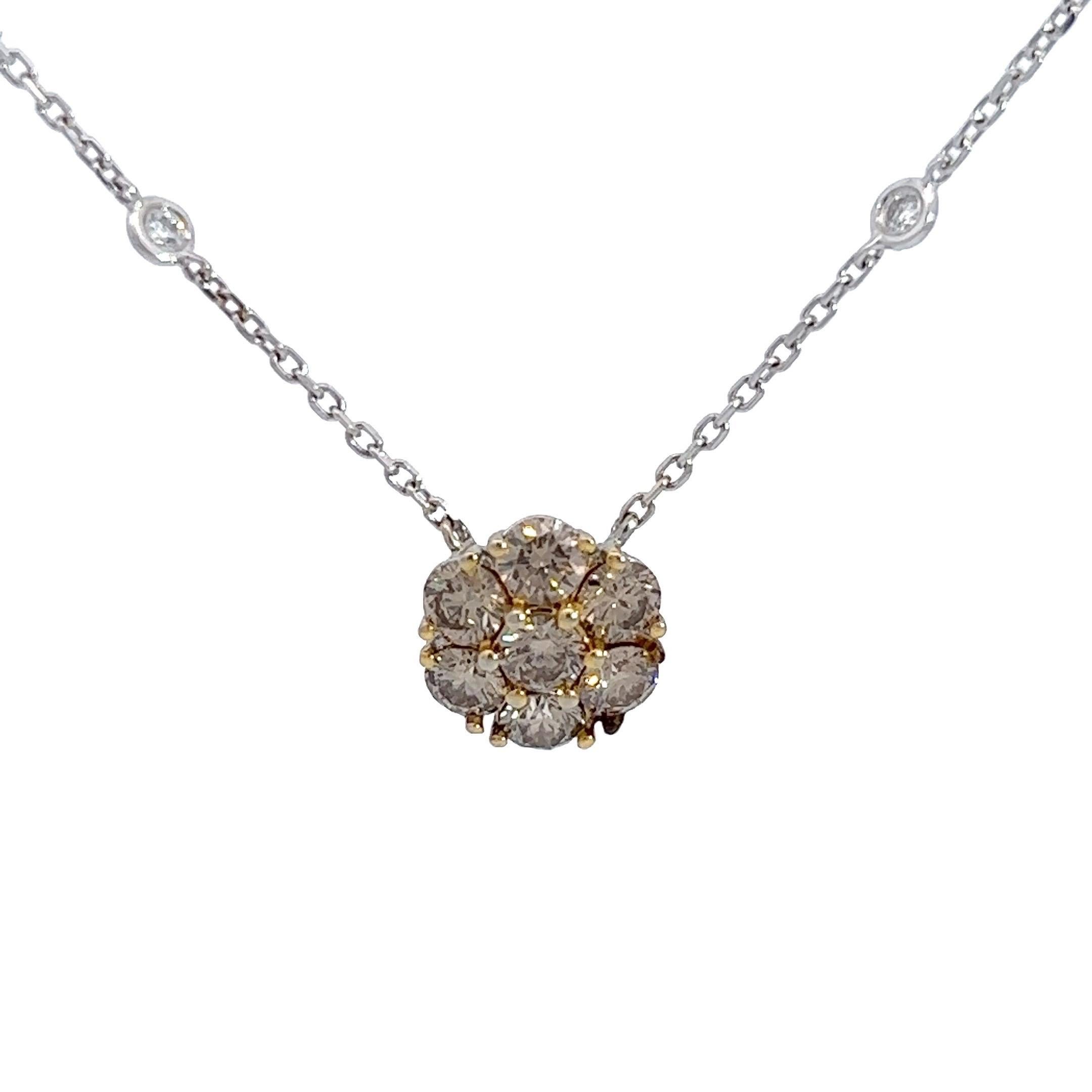Adorn yourself with sheer radiance through this enchanting pendant featuring Champagne Natural Full Brilliant Cut Diamonds. Set in 14k white gold with dazzling yellow prongs, the pendant exudes a unique and luxurious contrast that captivates the