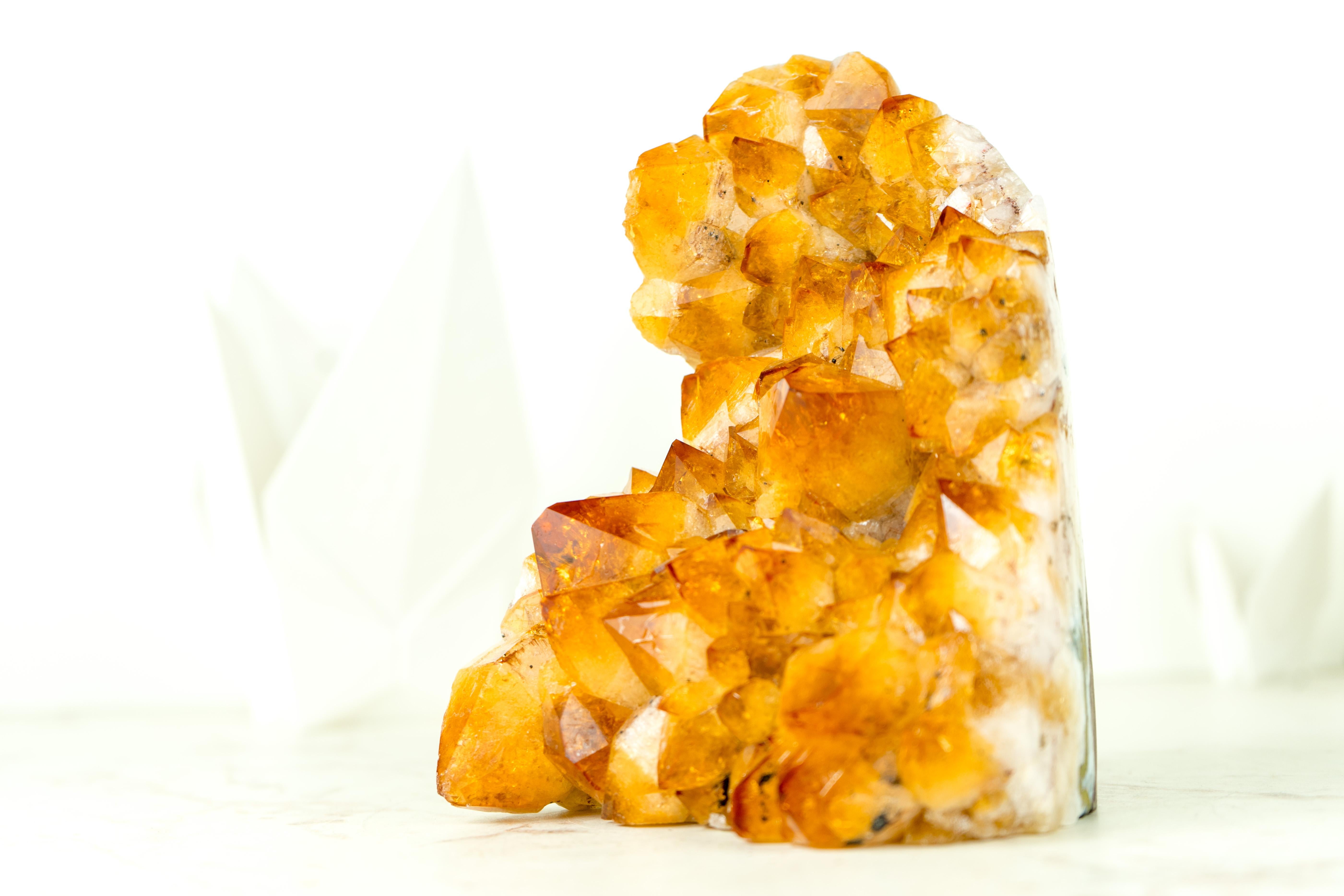 An extraordinary Citrine Cluster from Brazil that possesses world-class characteristics. Its deep, rich yellow tone brings beauty and elegance, making it a standout citrine for any collection, home decor, or energy healing. This remarkable Citrine