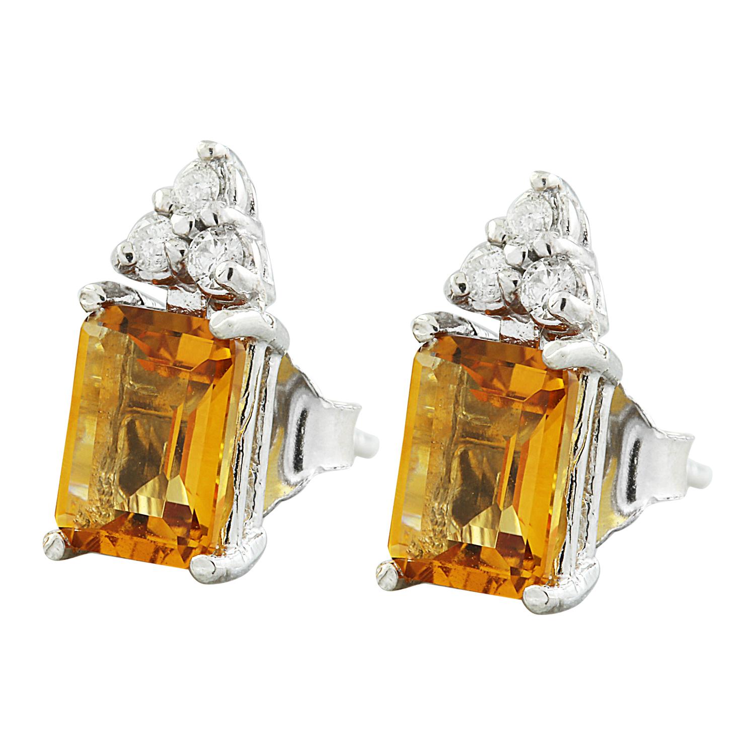 2.65 Carat Natural Citrine 14 Karat Solid White Gold Diamond Earrings
Stamped: 14K
Total Earrings Weight: 1.5 Grams 
Citrine Weight: 2.50 Carat (7.00x5.00 Millimeters)  
Diamond Weight: 0.15 Carat (F-G Color, VS2-SI1 Clarity )
Face Measures: