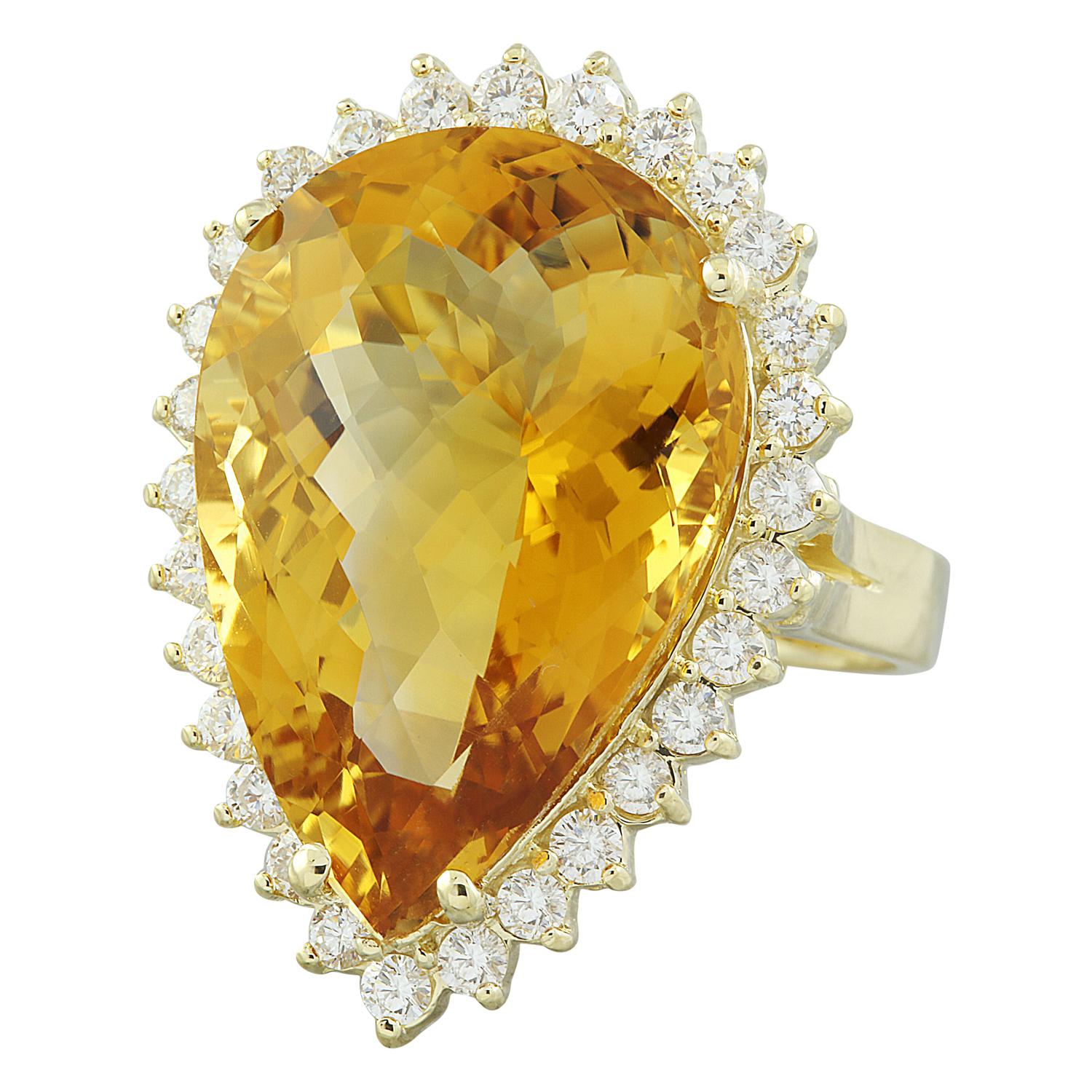 18.85 Carat Natural Citrine 14 Karat Solid Yellow Gold Diamond Ring
Stamped: 14K
Total Ring Weight: 10.4 Grams
Citrine Weight 17.85 Carat (22.00x15.00 Millimeters)
Diamond Weight: 1.00 carat (F-G Color, VS2-SI1 Clarity )
Face Measures: 28.40x20.05