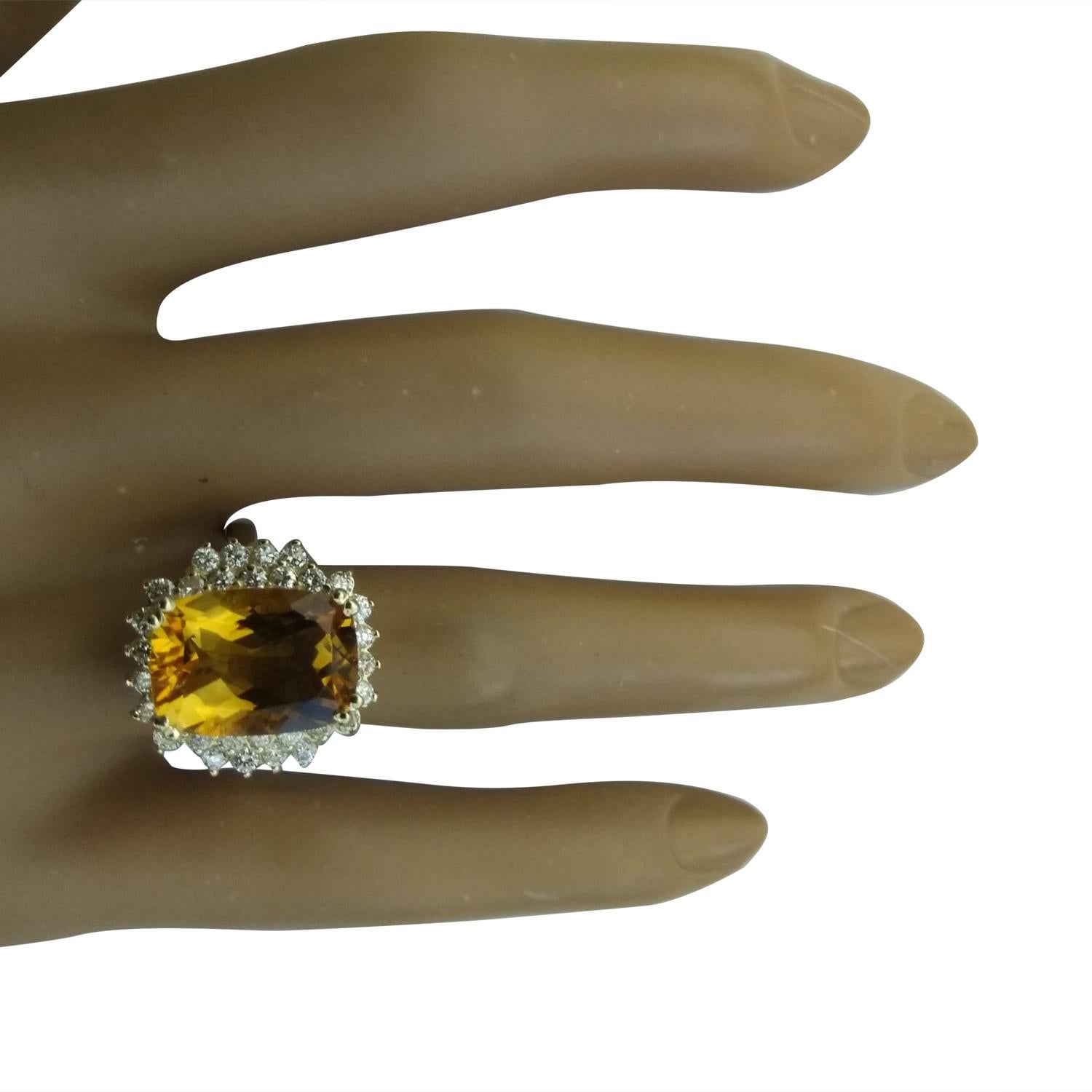8.80 Carat Natural Citrine 14 Karat Solid Yellow Gold Diamond Ring
Stamped: 14K 
Ring Size 7
Total Ring Weight: 5.7 Grams 
Citrine Weight 8.00 Carat (14.00x10.00 Millimeters)
Natural Citrine Treatment: Heating Only
Diamond Weight: 0.80 Carat (F-G