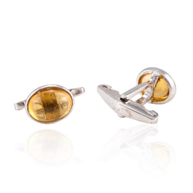 Introducing Natural Citrine Gemstone Cufflinks Made in Sterling Silver which is a fusion of surrealism and pop-art, designed to make a bold statement. 
Crafted with love and attention to detail, this features 6.4 carats of citrine studded which