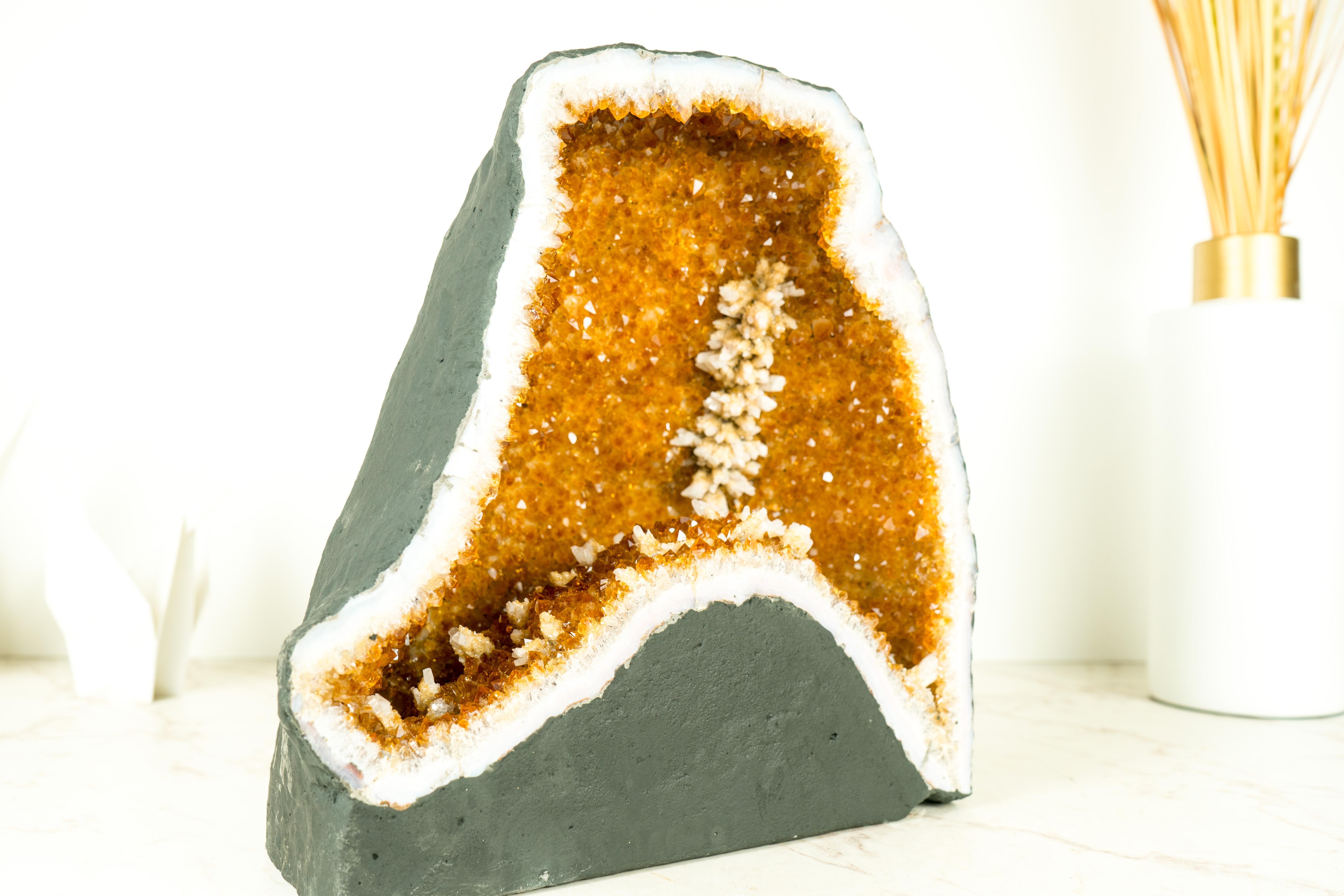 A Breathtaking Citrine Geode Cave with Deep Orange, Sparkly Citrine Druzy and Rare Calcite Flowers

▫️ Description

An extraordinary natural Citrine cave, featuring shiny, rich, saturated orange Citrine Druzy and beautiful formation of Calcite