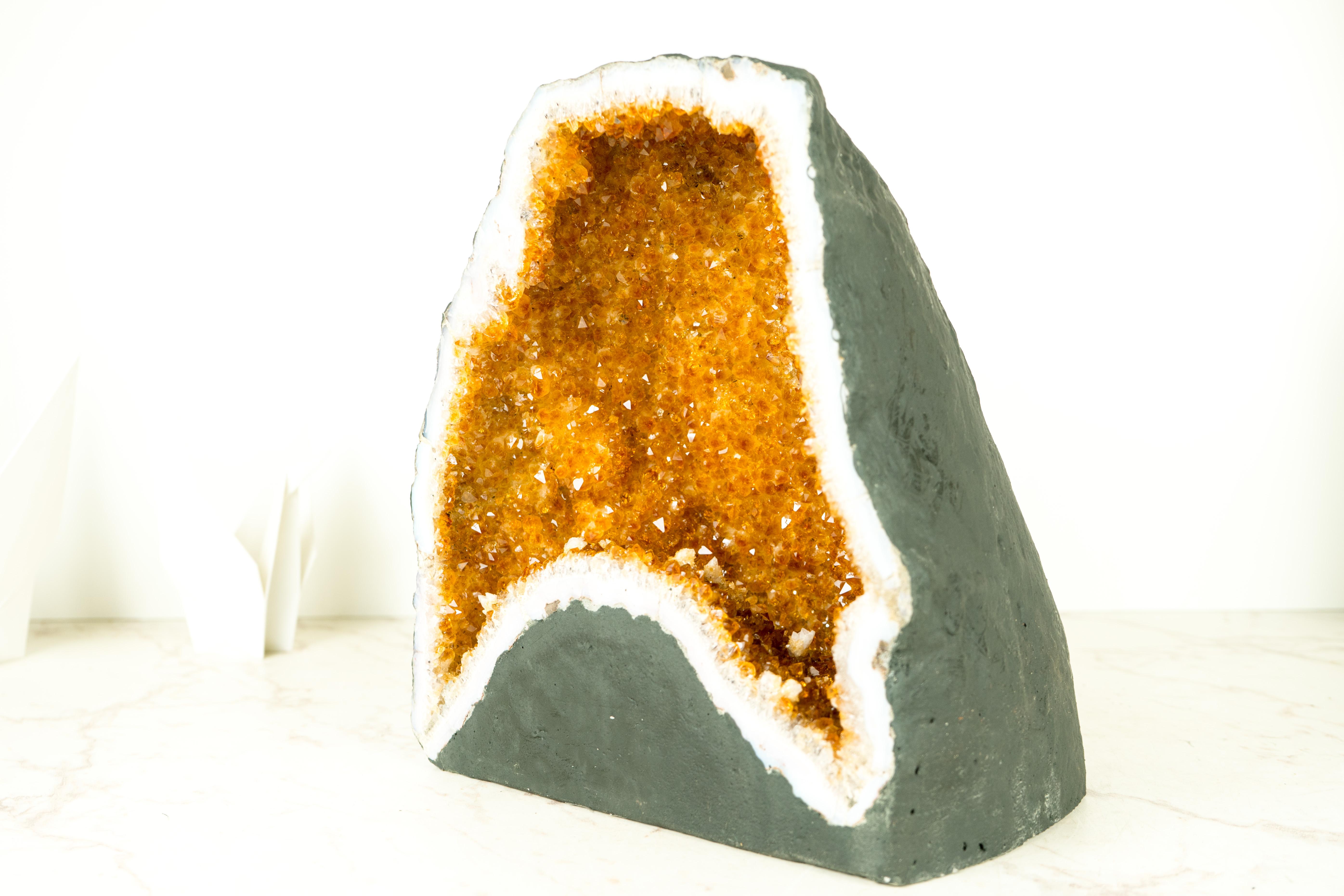 A Breathtaking Citrine Geode Cave with Deep Orange, Sparkly Citrine Druzy and Calcite Inclusions

▫️ Description

An extraordinary natural Citrine cave, featuring shiny, rich, saturated orange Citrine Druzy and beautiful formation of Calcite