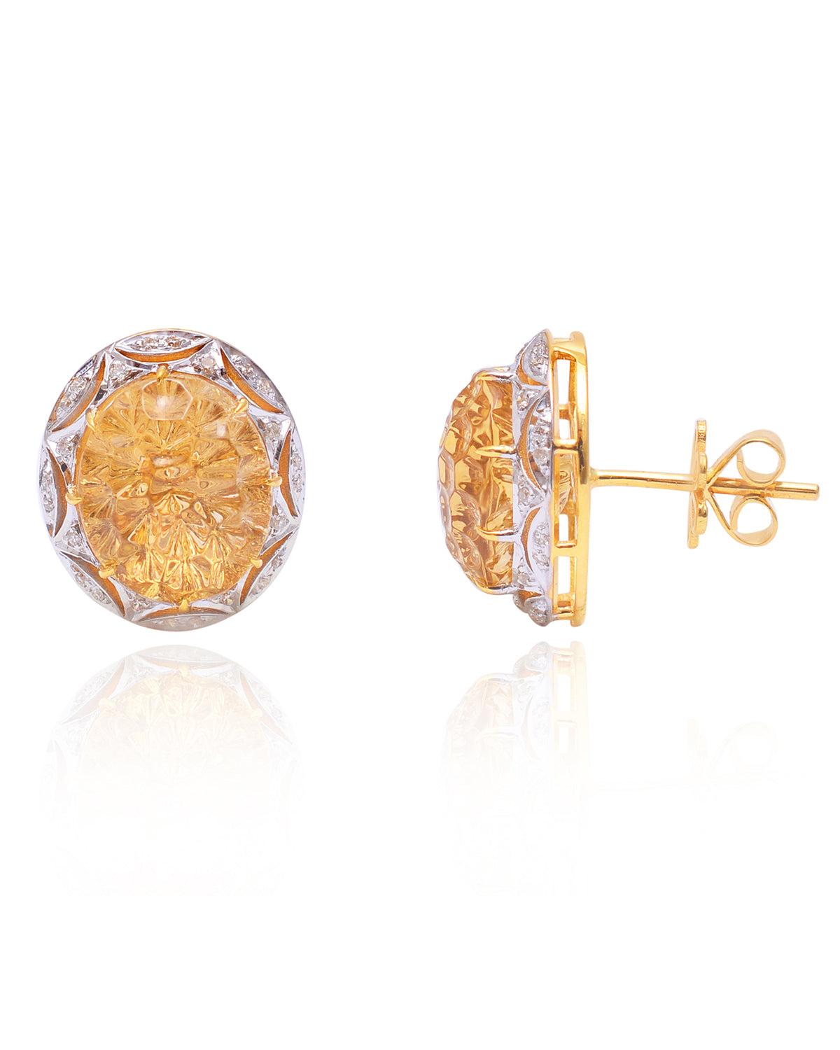 These stud earrings are made with beautiful citrine gemstone brilliant cut diamonds around the gemstone. It is set with in 14k yellow gold and perfect for gift to someone.

Specifications:

Dimensions: 16*14 MM
Gross Weight: 5.18 gms
Gold Weight: