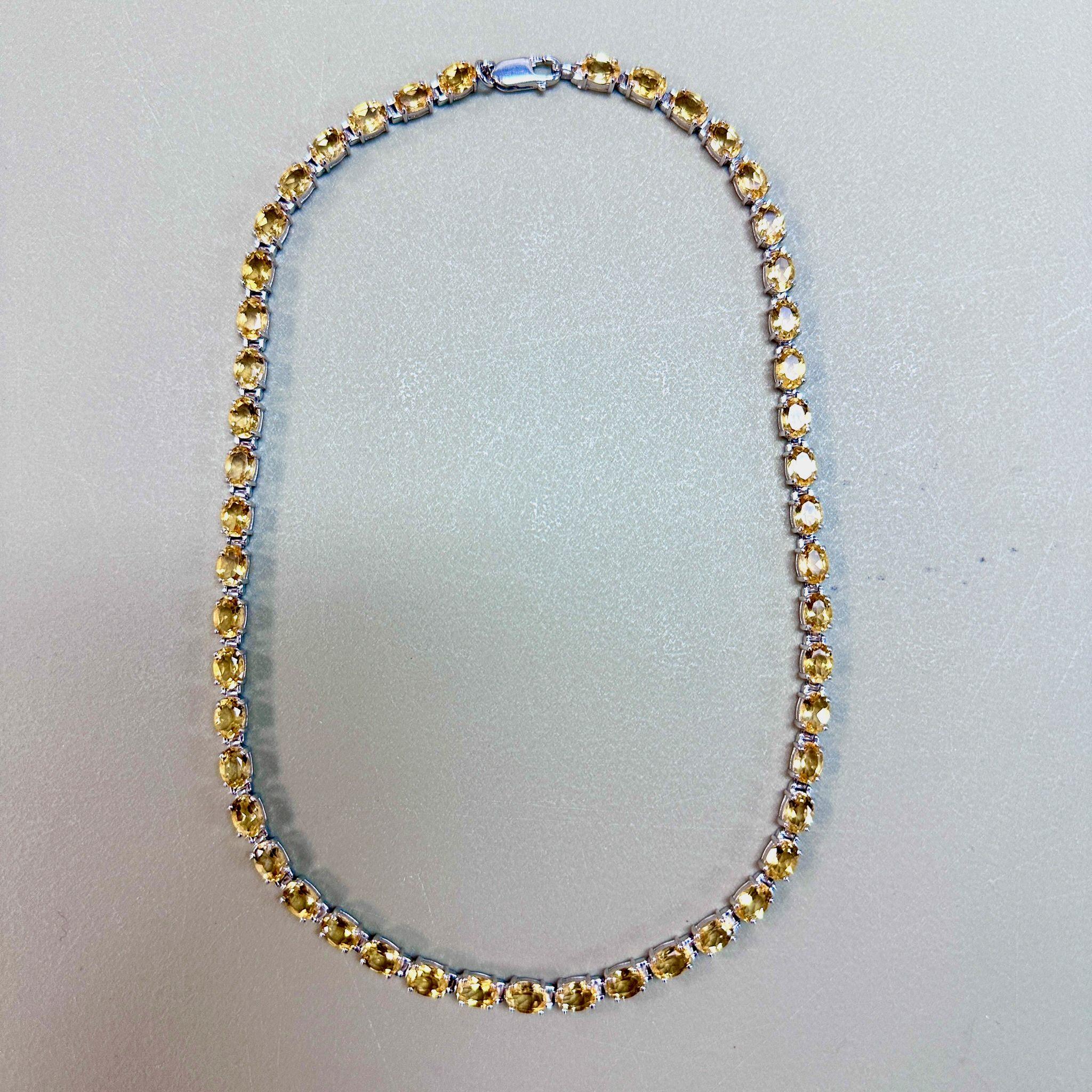 It comes with the appraisal by GIA GG/AJP
Citrine = 39.20 Carats ( 7 x 5 mm )
Cut: Oval
Primary Stone Color: Yellow
Total Quantity of Citrine: 49
Clasp :Lobster Claw Clasps
Metal: Sterling Silver