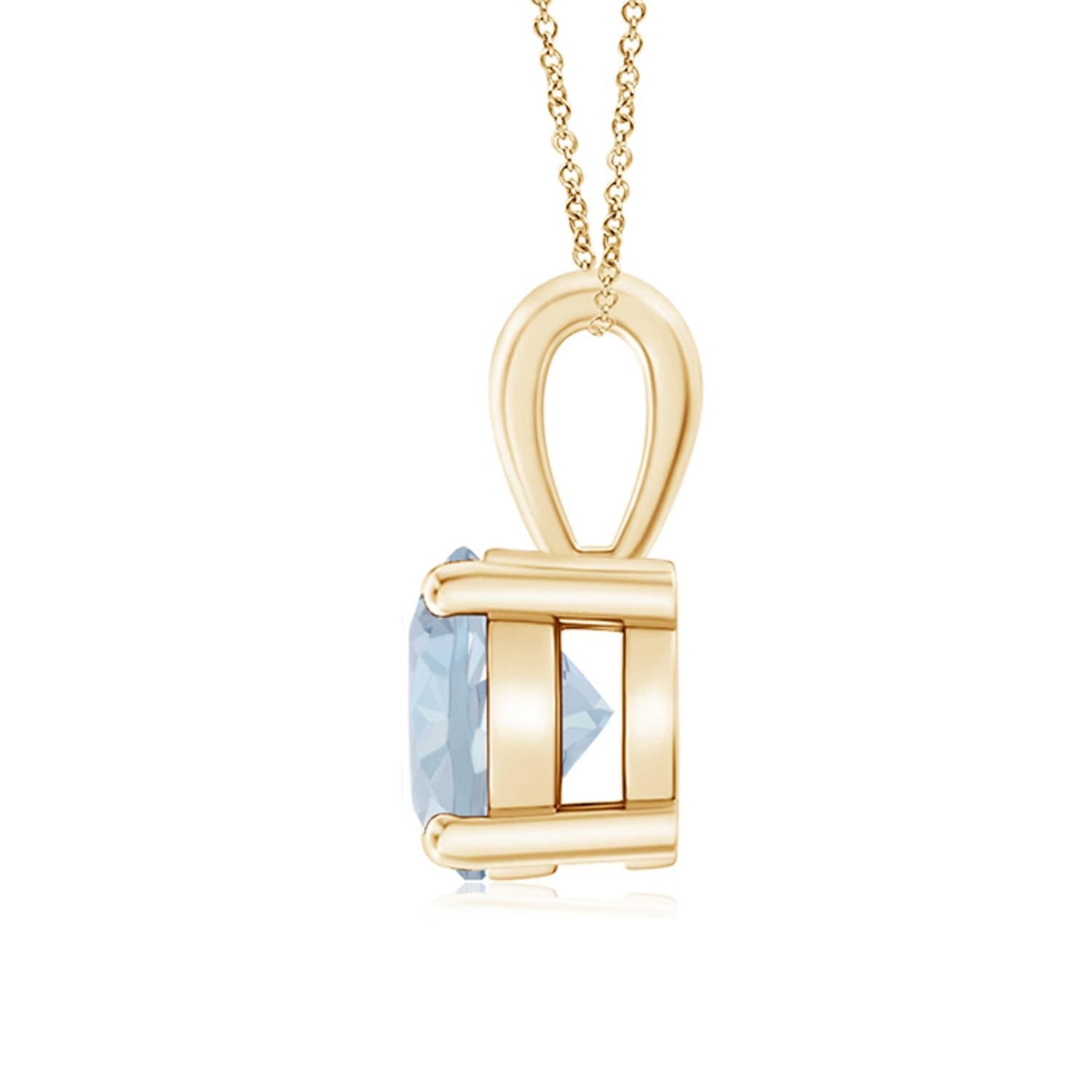 Linked to a lustrous bale is a sea blue aquamarine solitaire secured in a four prong setting. Crafted in 18k yellow gold, the elegant design of this classic aquamarine pendant draws all attention towards the magnificence of the center stone.