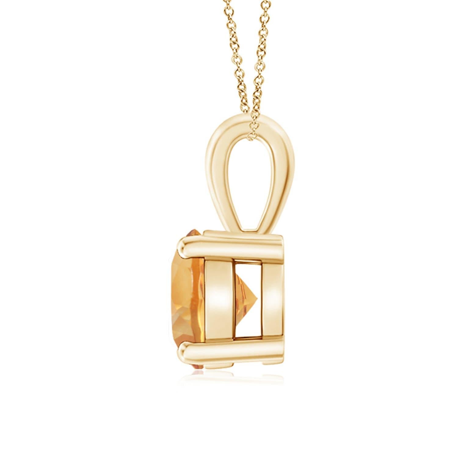 Une citrine étincelante est reliée à une balle unique et est fixée dans une monture à quatre griffes. Ce pendentif solitaire en citrine présente un design simple et attire toute l'attention sur sa teinte jaune miel. Il est réalisé en or jaune 18