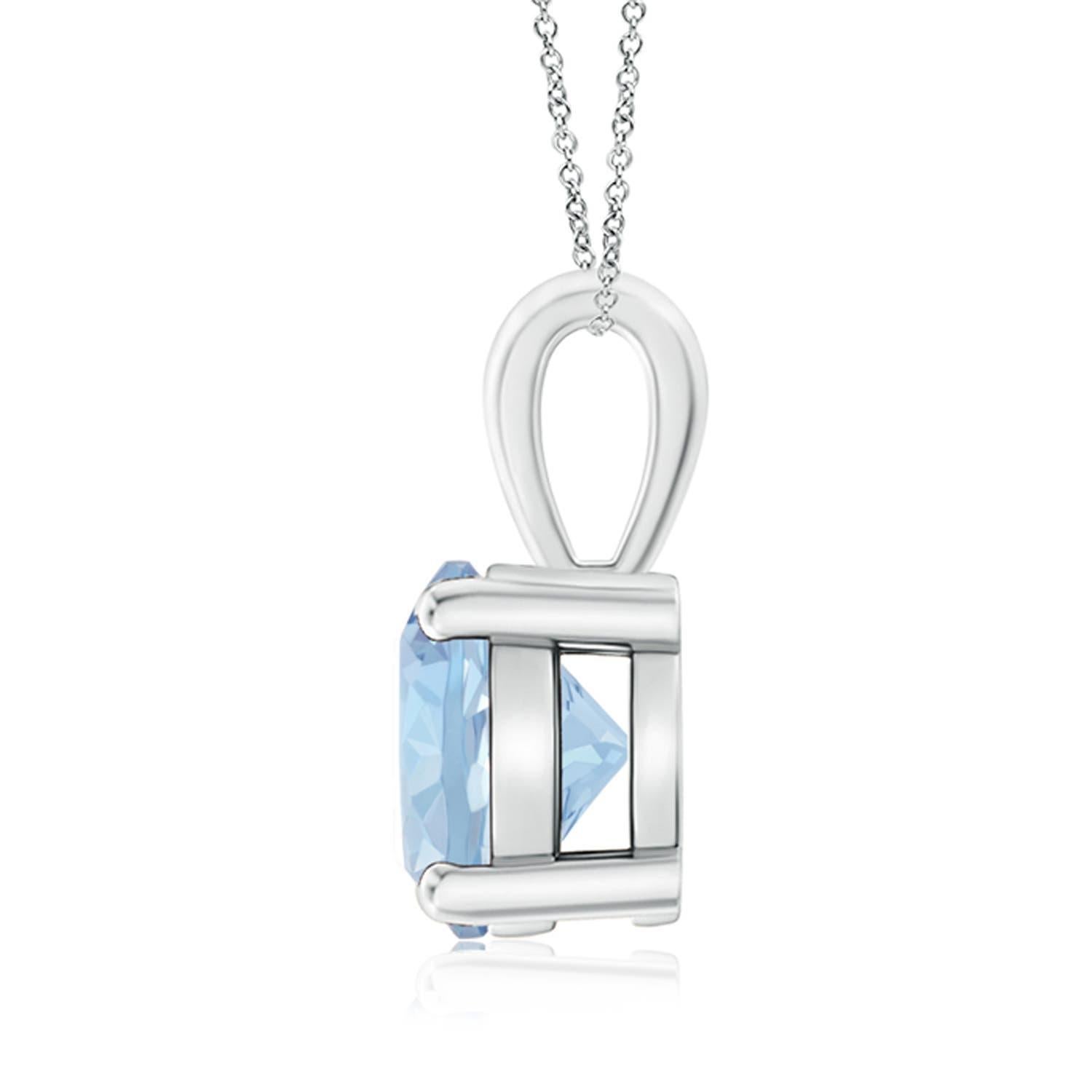 Linked to a lustrous bale is a sea blue aquamarine solitaire secured in a four prong setting. Crafted in silver, the elegant design of this classic aquamarine pendant draws all attention towards the magnificence of the center stone. Available in