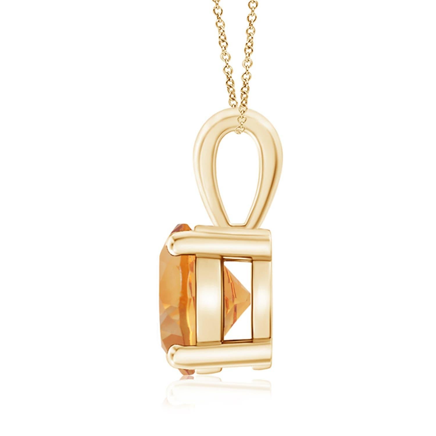 Une citrine étincelante est reliée à une balle unique et est fixée dans une monture à quatre griffes. Ce pendentif solitaire en citrine présente un design simple et attire toute l'attention sur sa teinte jaune miel. Il est réalisé en or jaune 14k.