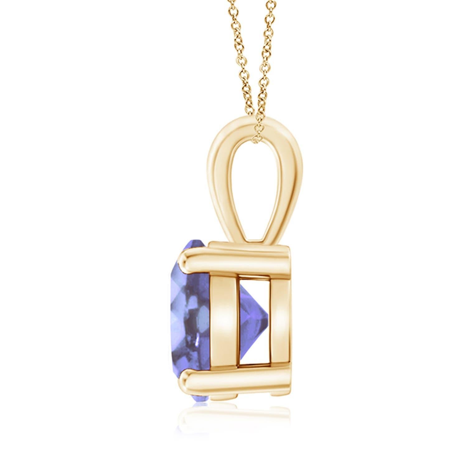 Un solitaire de tanzanite bleu violet, serti sur quatre griffes, est relié à une balle lustrée. Réalisé en or jaune 14 carats, le design élégant de ce pendentif classique en tanzanite attire toute l'attention sur la magnificence de la pierre