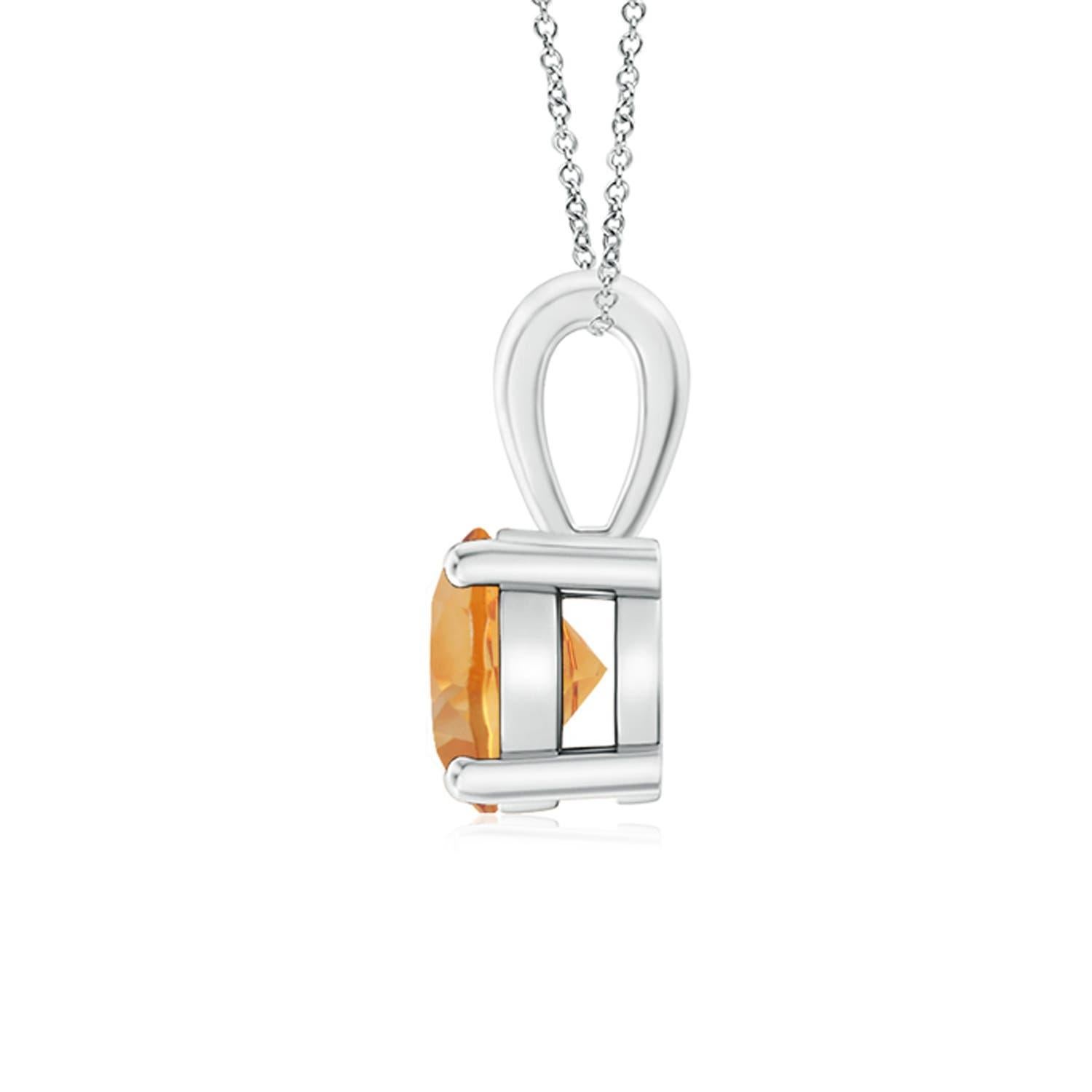 Une citrine étincelante est reliée à une balle unique et est fixée dans une monture à quatre griffes. Ce pendentif solitaire en citrine présente un design simple et attire toute l'attention sur sa teinte jaune miel. Il est réalisé en or blanc 18