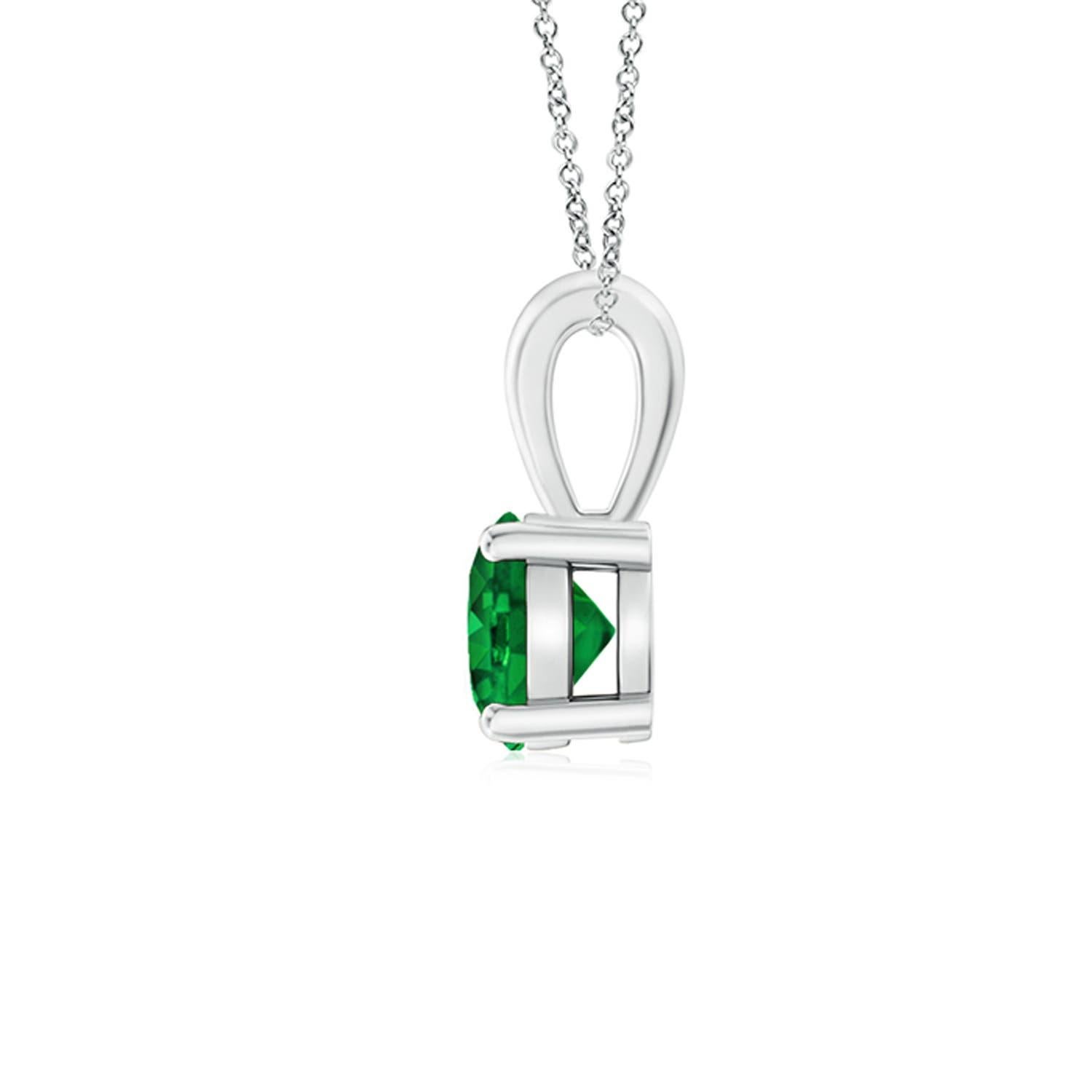 Linked to a lustrous bale is a lush green emerald solitaire secured in a four prong setting. Crafted in Platinum, the elegant design of this classic emerald pendant draws all attention towards the magnificence of the center stone.
Emerald is the