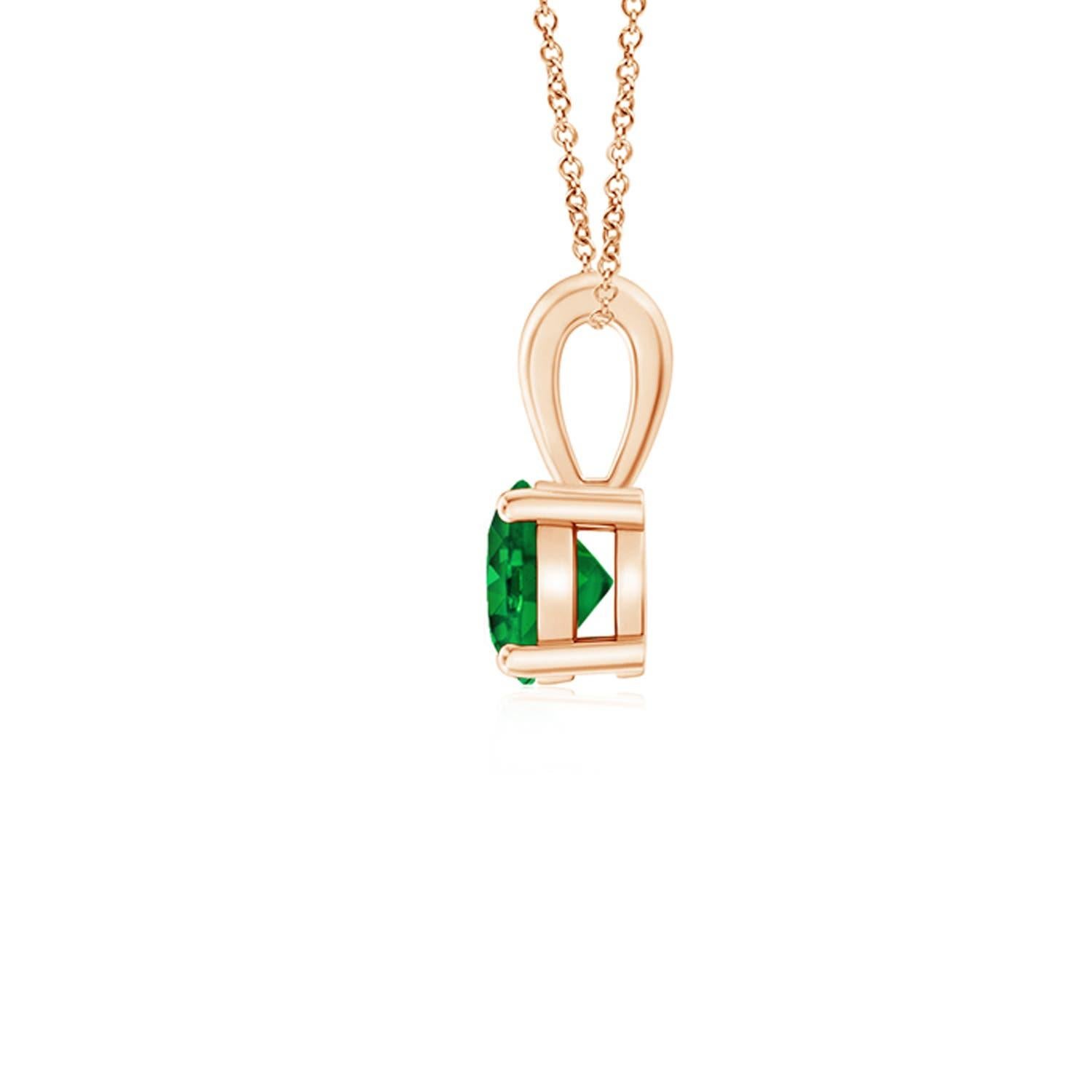 Linked to a lustrous bale is a lush green emerald solitaire secured in a four prong setting. Crafted in 14k rose gold, the elegant design of this classic emerald pendant draws all attention towards the magnificence of the center stone.
Emerald is