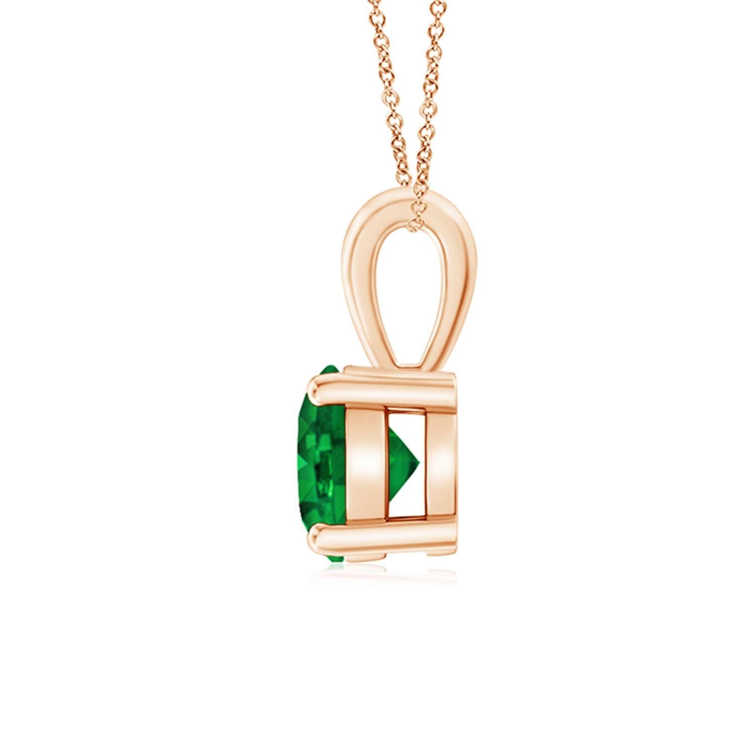 Linked to a lustrous bale is a lush green emerald solitaire secured in a four prong setting. Crafted in 14k rose gold, the elegant design of this classic emerald pendant draws all attention towards the magnificence of the center stone.
Emerald is