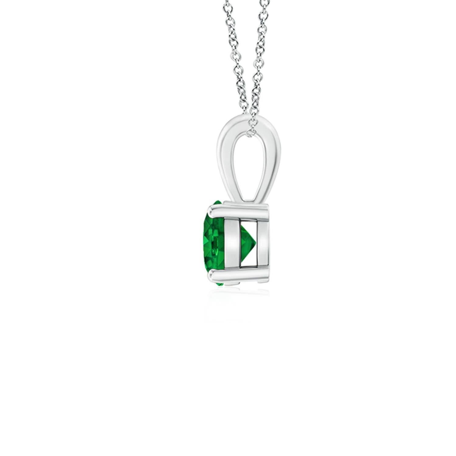 Linked to a lustrous bale is a lush green emerald solitaire secured in a four prong setting. Crafted in 14k white gold, the elegant design of this classic emerald pendant draws all attention towards the magnificence of the center stone.
Emerald is