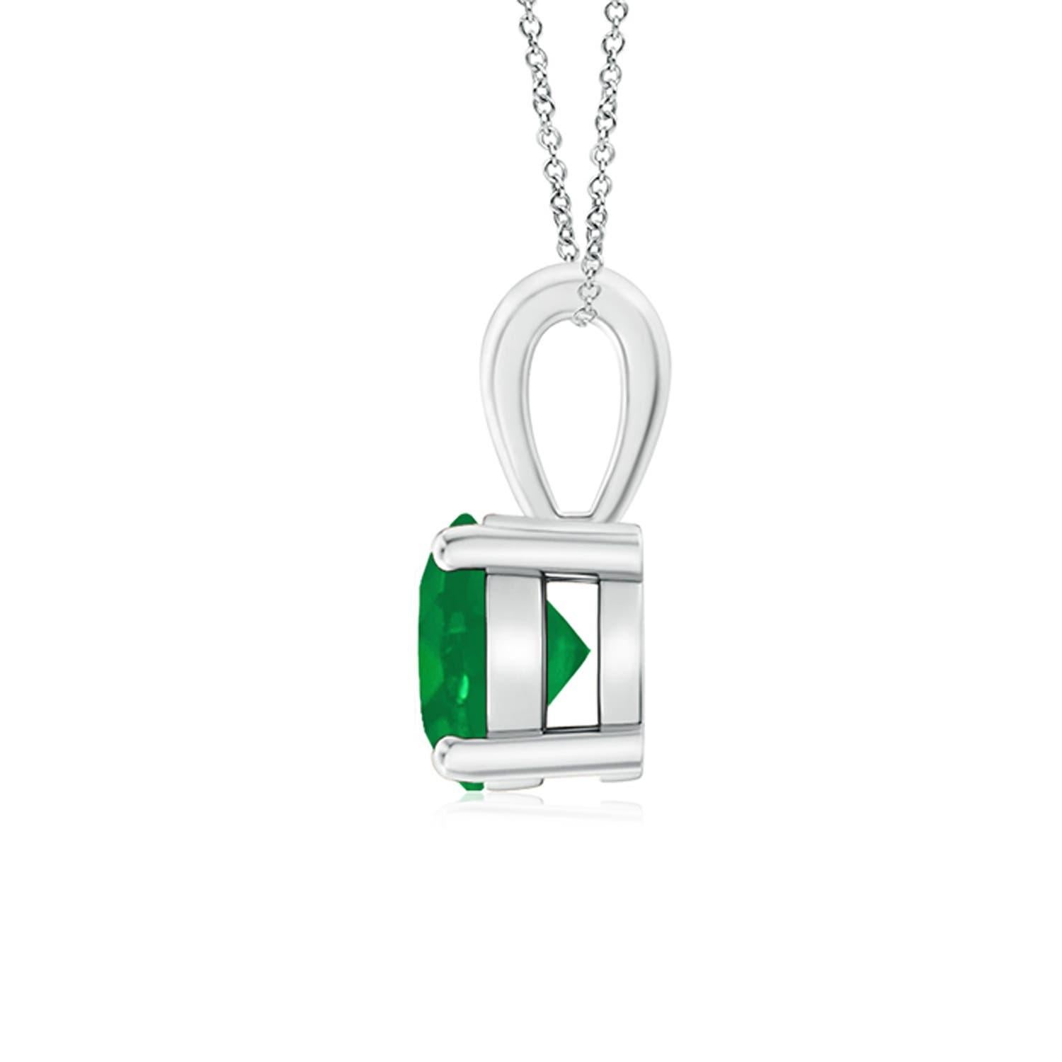 Linked to a lustrous bale is a lush green emerald solitaire secured in a four prong setting. Crafted in 14k white gold, the elegant design of this classic emerald pendant draws all attention towards the magnificence of the center stone.
Emerald is