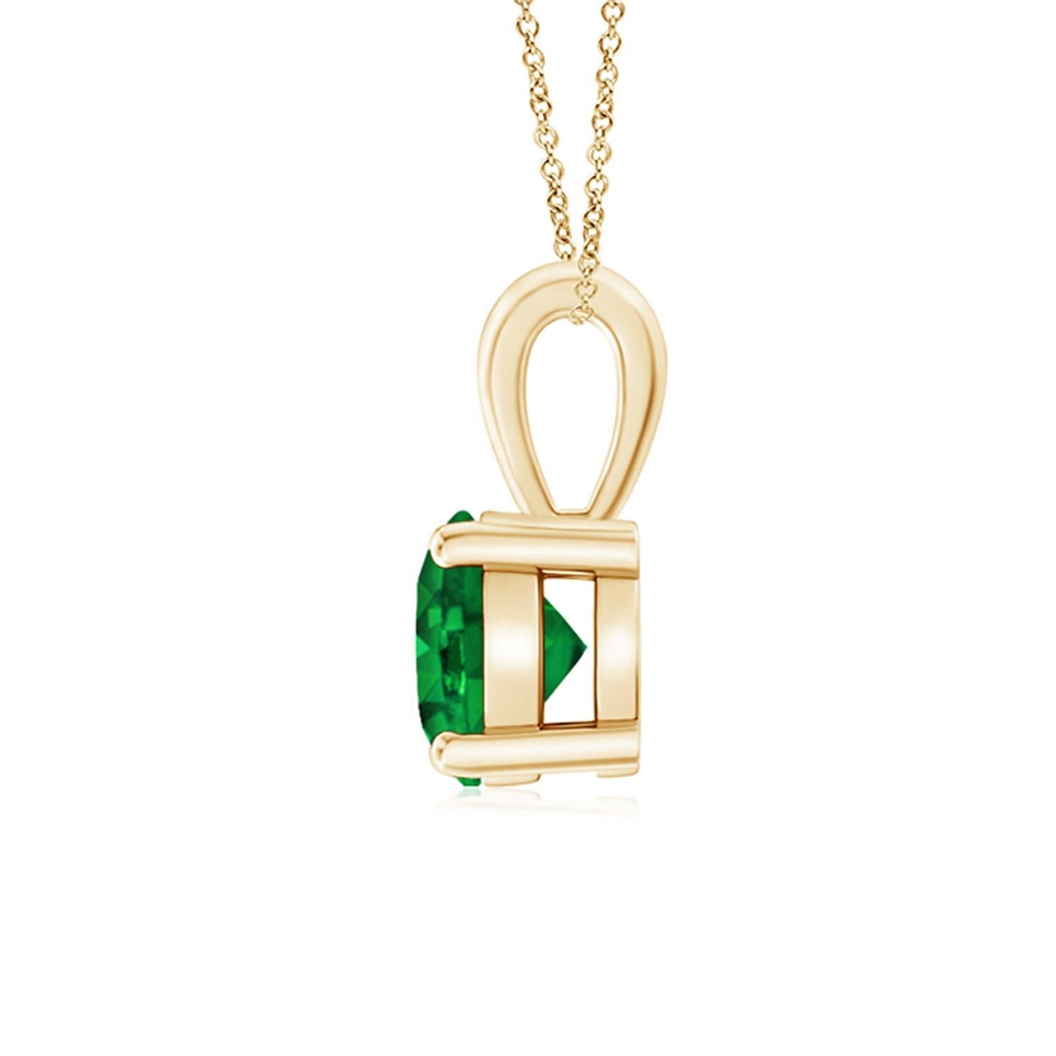 Linked to a lustrous bale is a lush green emerald solitaire secured in a four prong setting. Crafted in 14k yellow gold, the elegant design of this classic emerald pendant draws all attention towards the magnificence of the center stone.
Emerald is