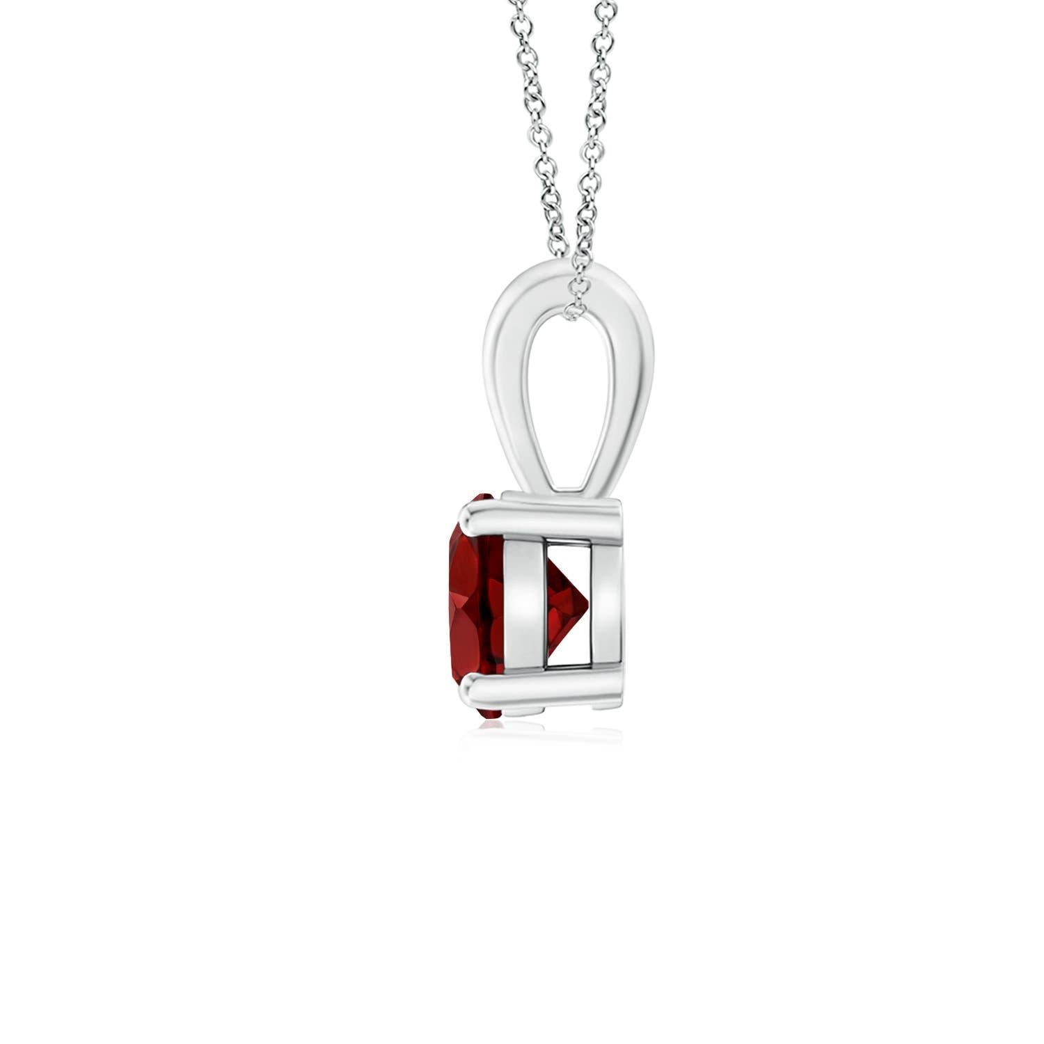 Linked to a single bale is a sparkling garnet secured in a four prong setting. This solitaire garnet pendant has a simple design and draws all the attention towards its deep red hue. It is crafted in platinum.
Garnet is the Birthstone for January