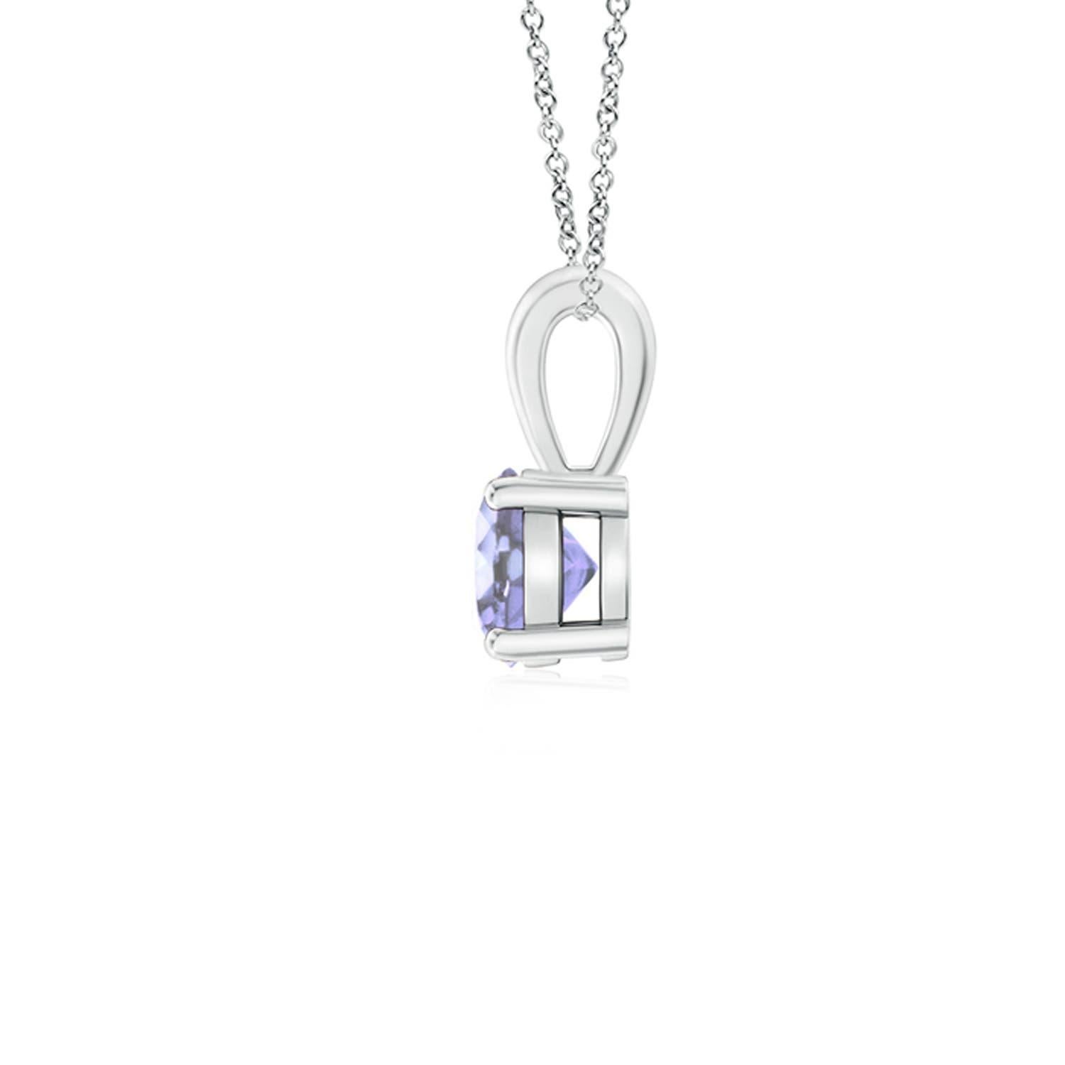 Un solitaire de tanzanite bleu violet, serti sur quatre griffes, est relié à une balle lustrée. Réalisé en platine, le design élégant de ce pendentif classique en tanzanite attire toute l'attention sur la magnificence de la pierre centrale.