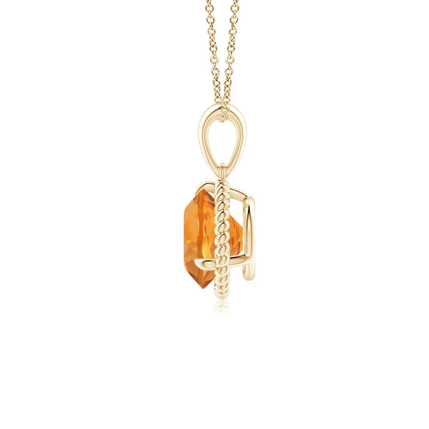 D'une élégance féminine, ce pendentif solitaire en citrine est conçu en or jaune 14k. La citrine ronde sertie de griffes est entourée d'un cadre en corde torsadée qui confère une touche de distinction au design. Disponible en différents poids de