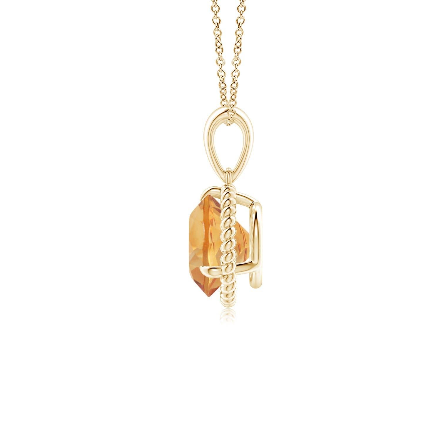D'une élégance toute féminine, ce pendentif solitaire en citrine est conçu en or jaune 18 carats. La citrine ronde sertie de griffes est entourée d'un cadre en corde torsadée qui confère une touche de distinction au design. Disponible en différents